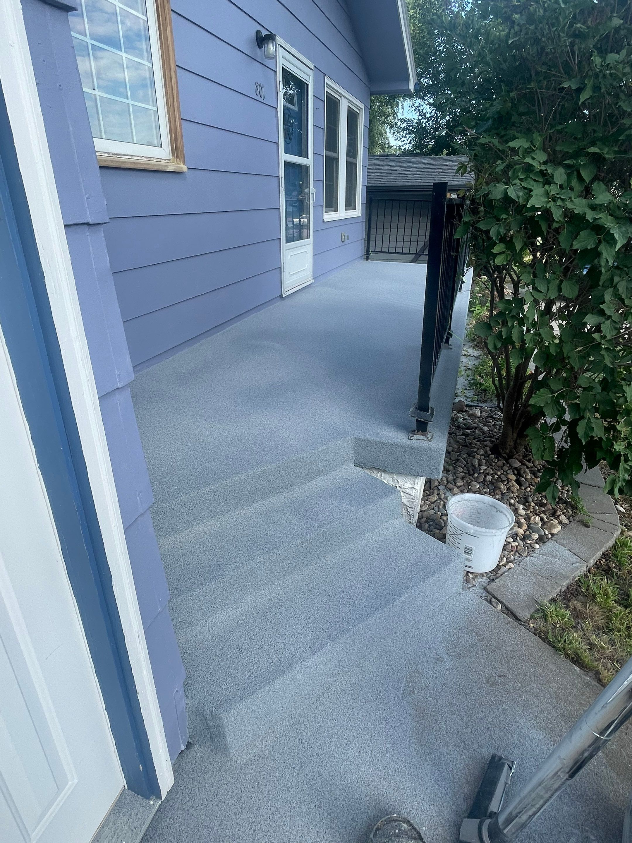 Sioux Falls Concrete Porch Coating with Starry Evening Finish by Select Painting, Coatings & Garage Cabinets