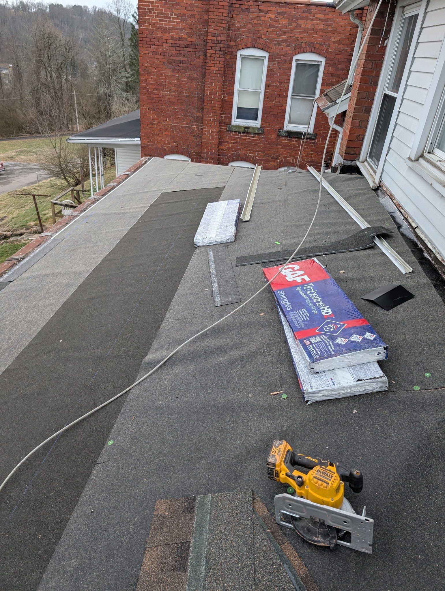 Residential Roofing Installation using GAF Timberline HDZ Barkwood by Rainstoppers Roofing