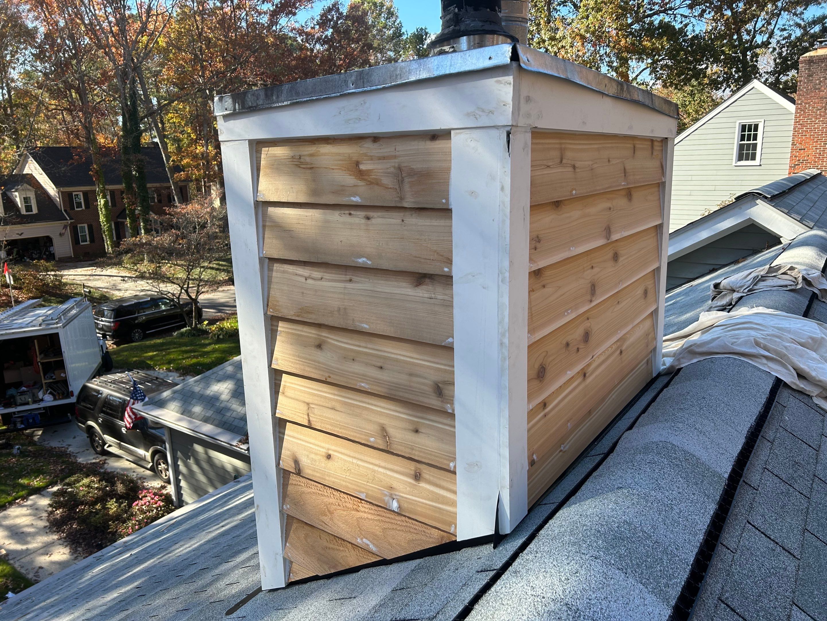 Roof Repairs/Chimney Siding  by Pro Performance Roofing