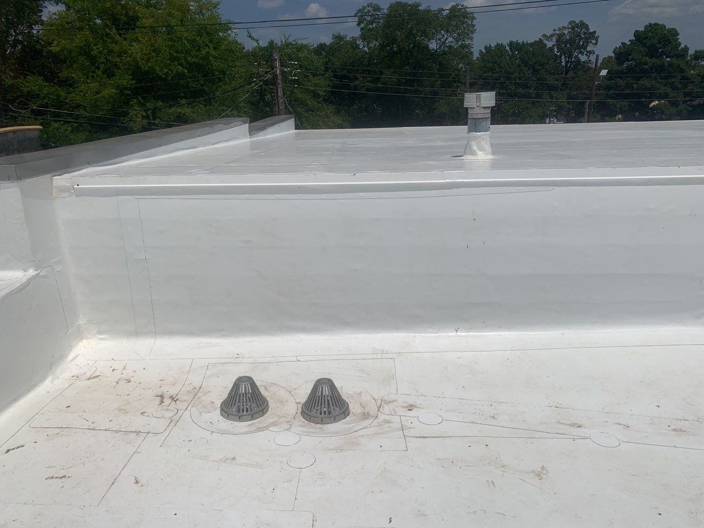 Commercial Roofing Installation in DeQueen, AR, using 50 mil PVC by Hostetler Roofing