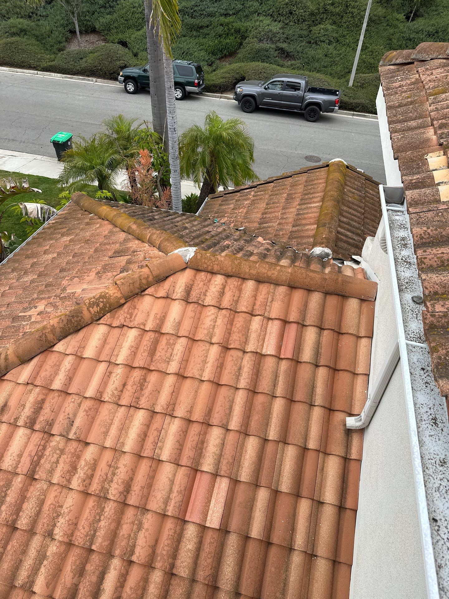 Orange County gutter cleaning using a vacuum by Property Cleaning Experts, LLC