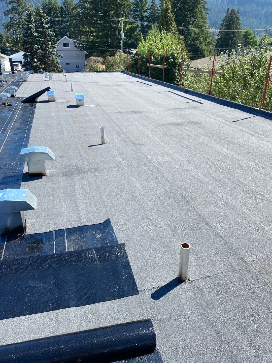 Residential ReRoofing Installation using IKO 2ply sbs  by Top Notch Roofing Inc