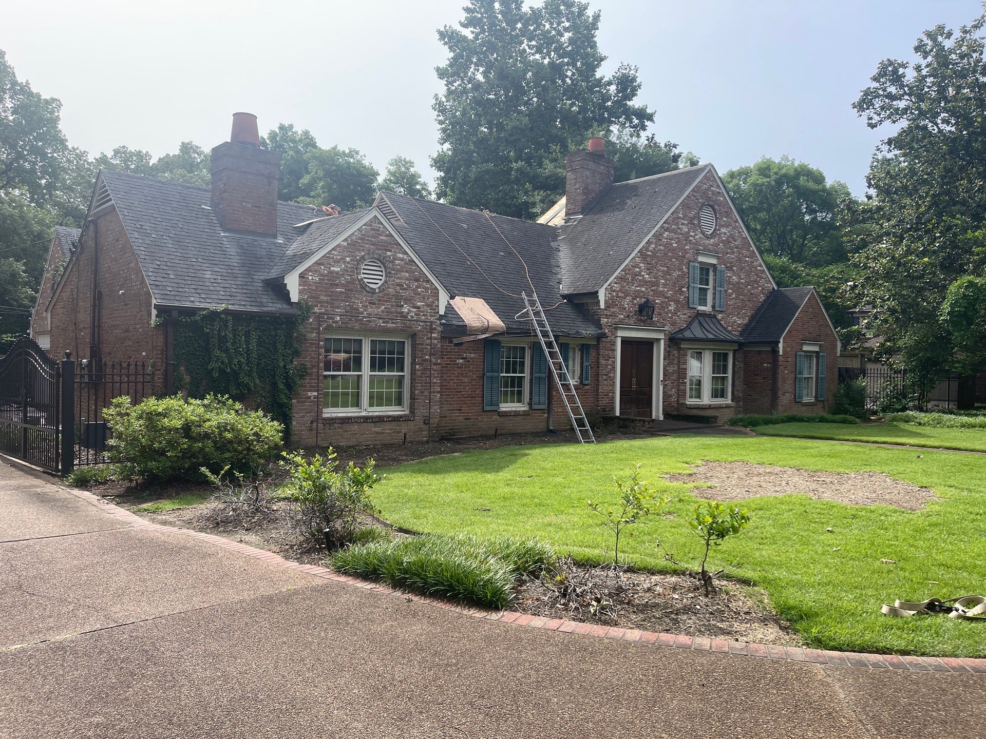 Full Roof Replacement with gutter upgrade after tree impact damage in East Memphis by Revival Roofing Services