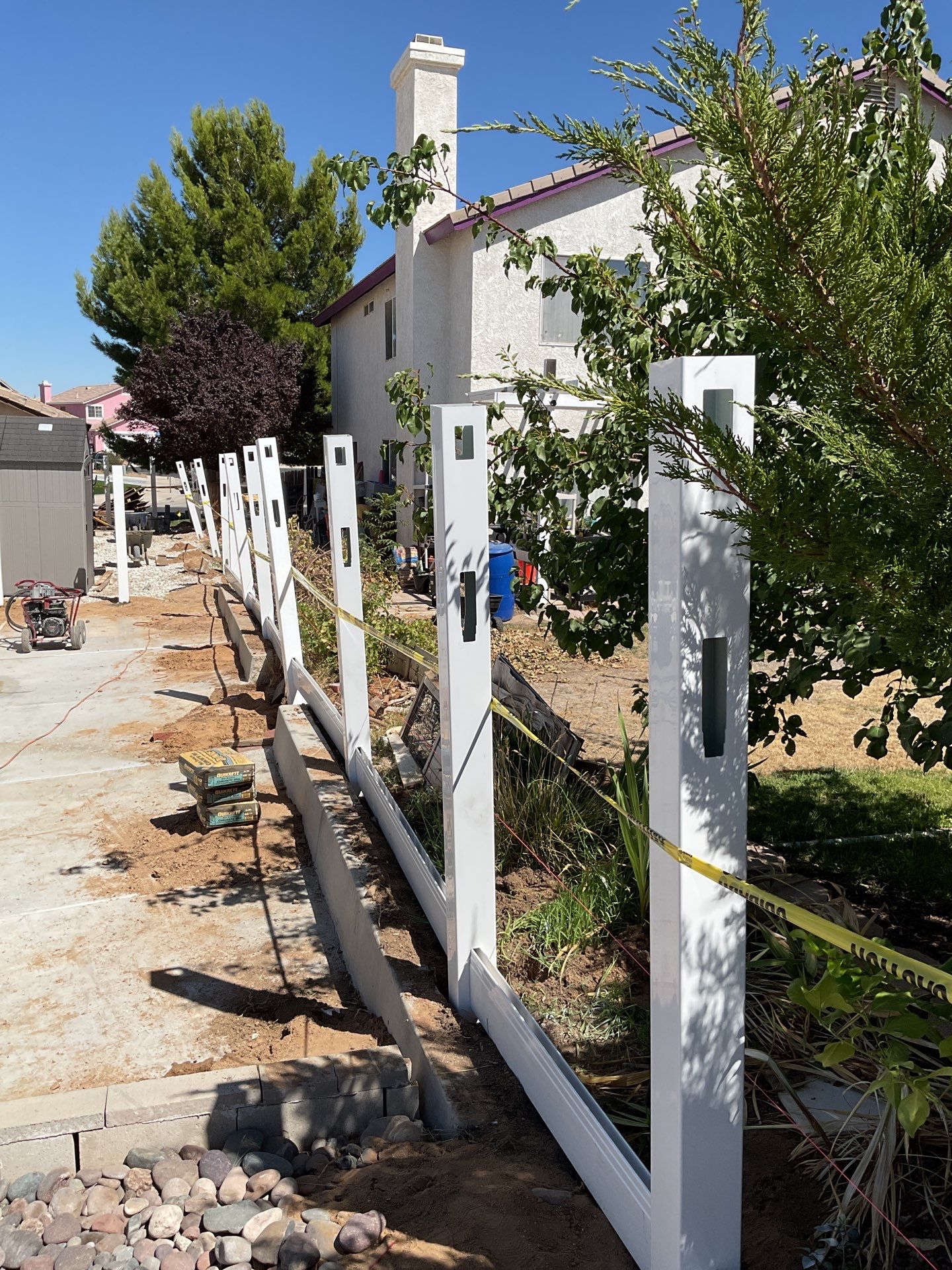 Lattice Vinyl with Privacy Vinyl Fence by Fence Guys Inc.