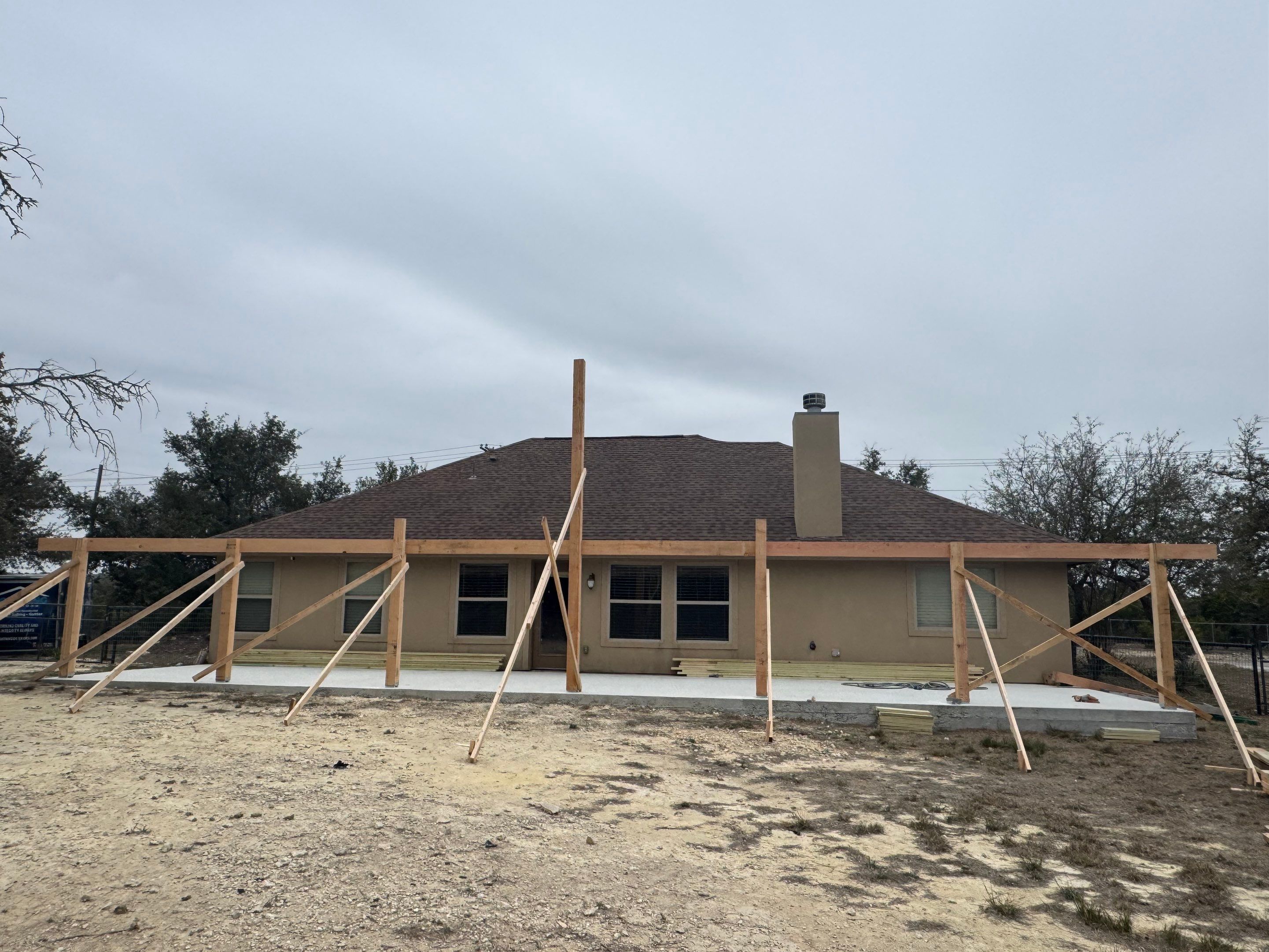 Reroof with Back Patio Addition using Owens Corning Duration Aged Copper by Lightning Exteriors