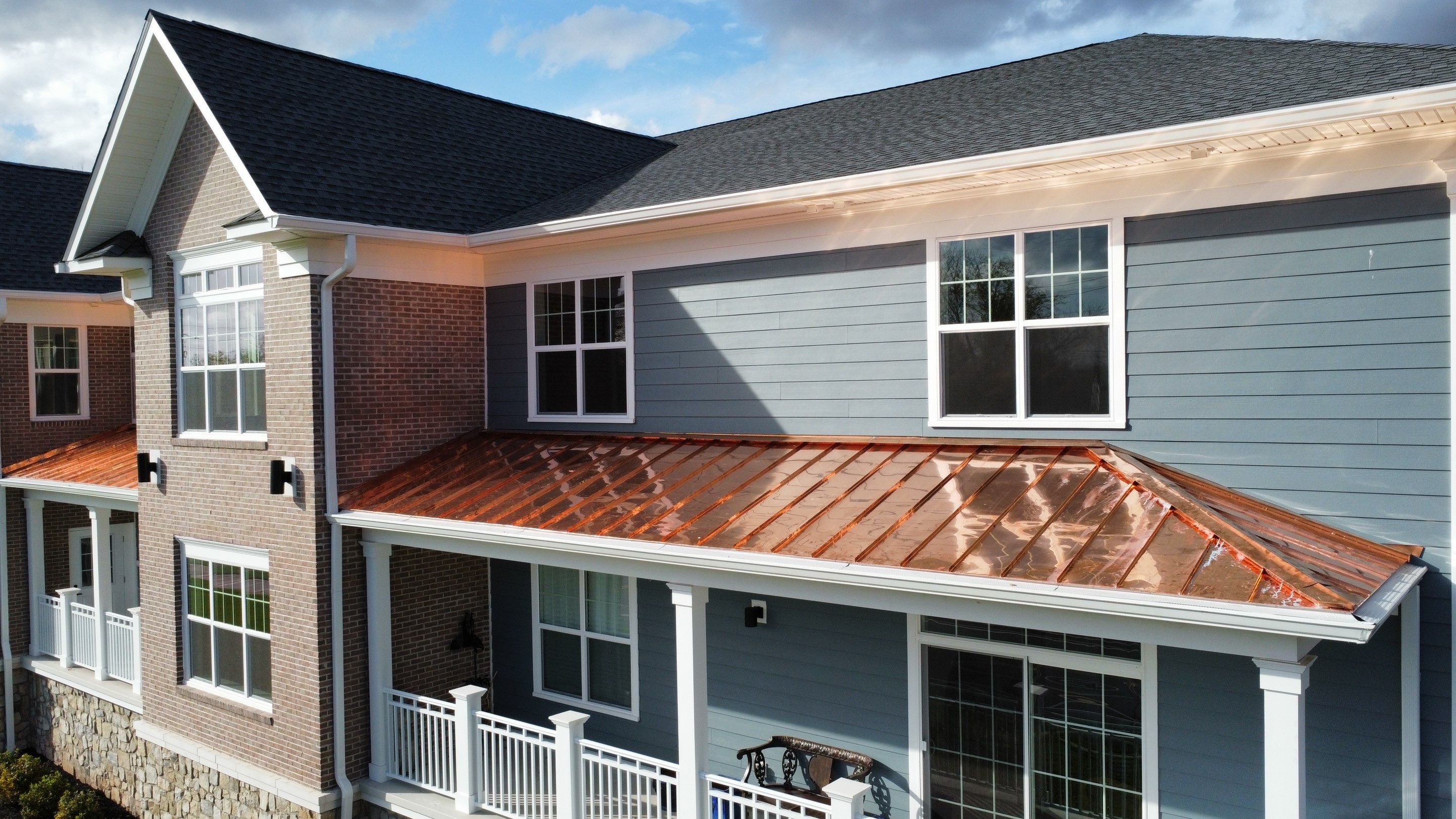 Standing Seam Metal Roof using Copper by CMNG LLC