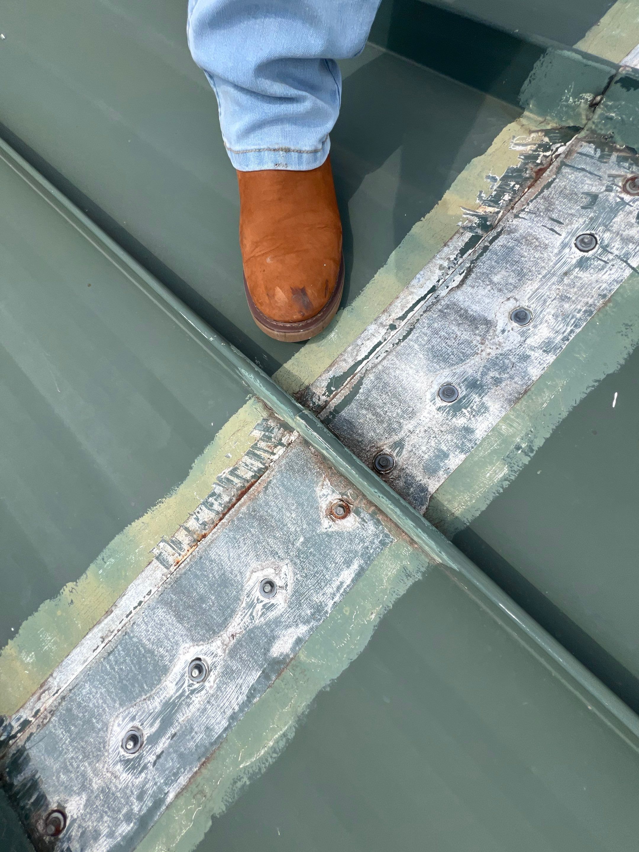 Hail Damage using Metal by Roof Repair Company