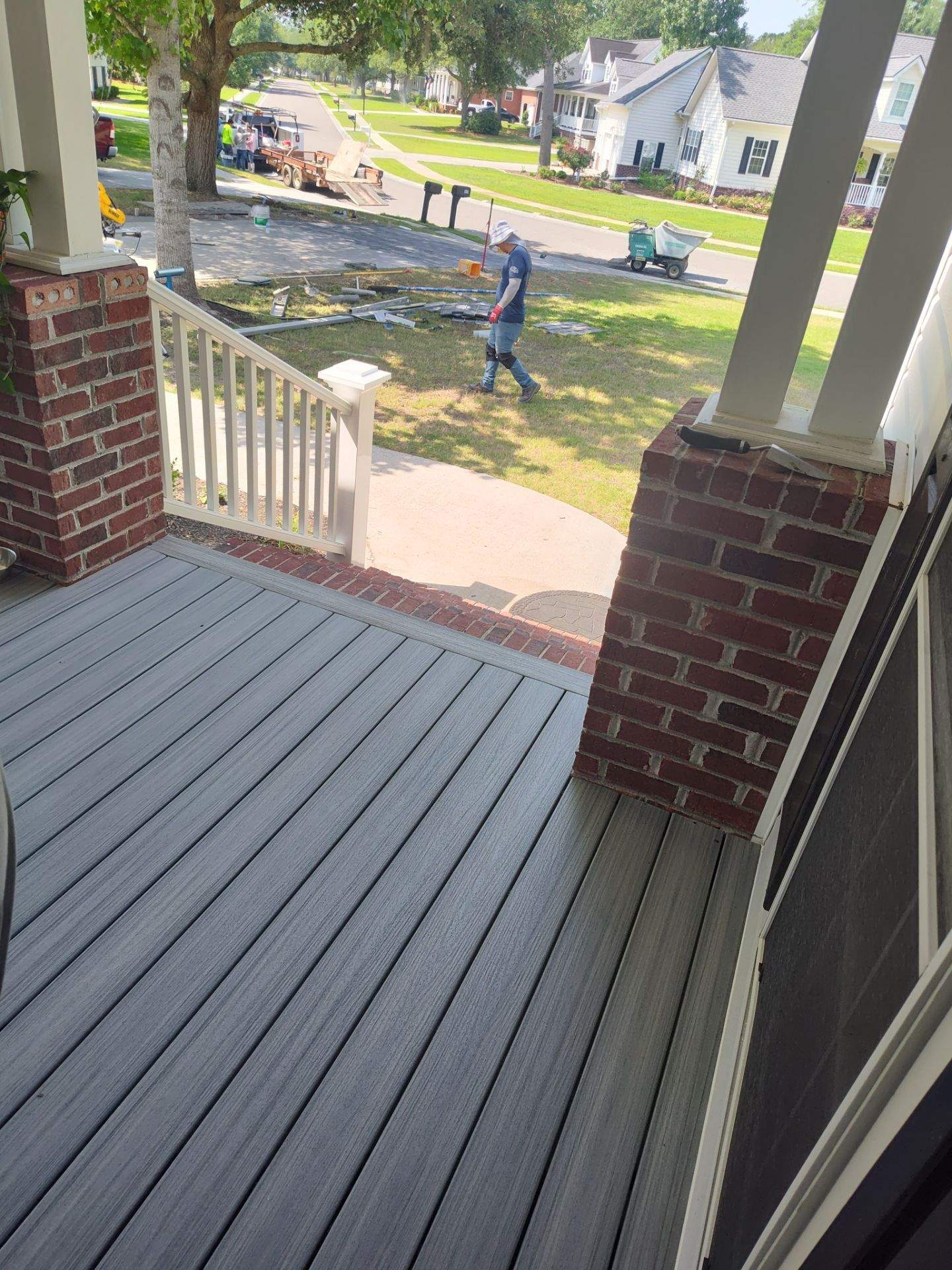 Outside porch and concreate work by Cornerstone Home Builders, LLC