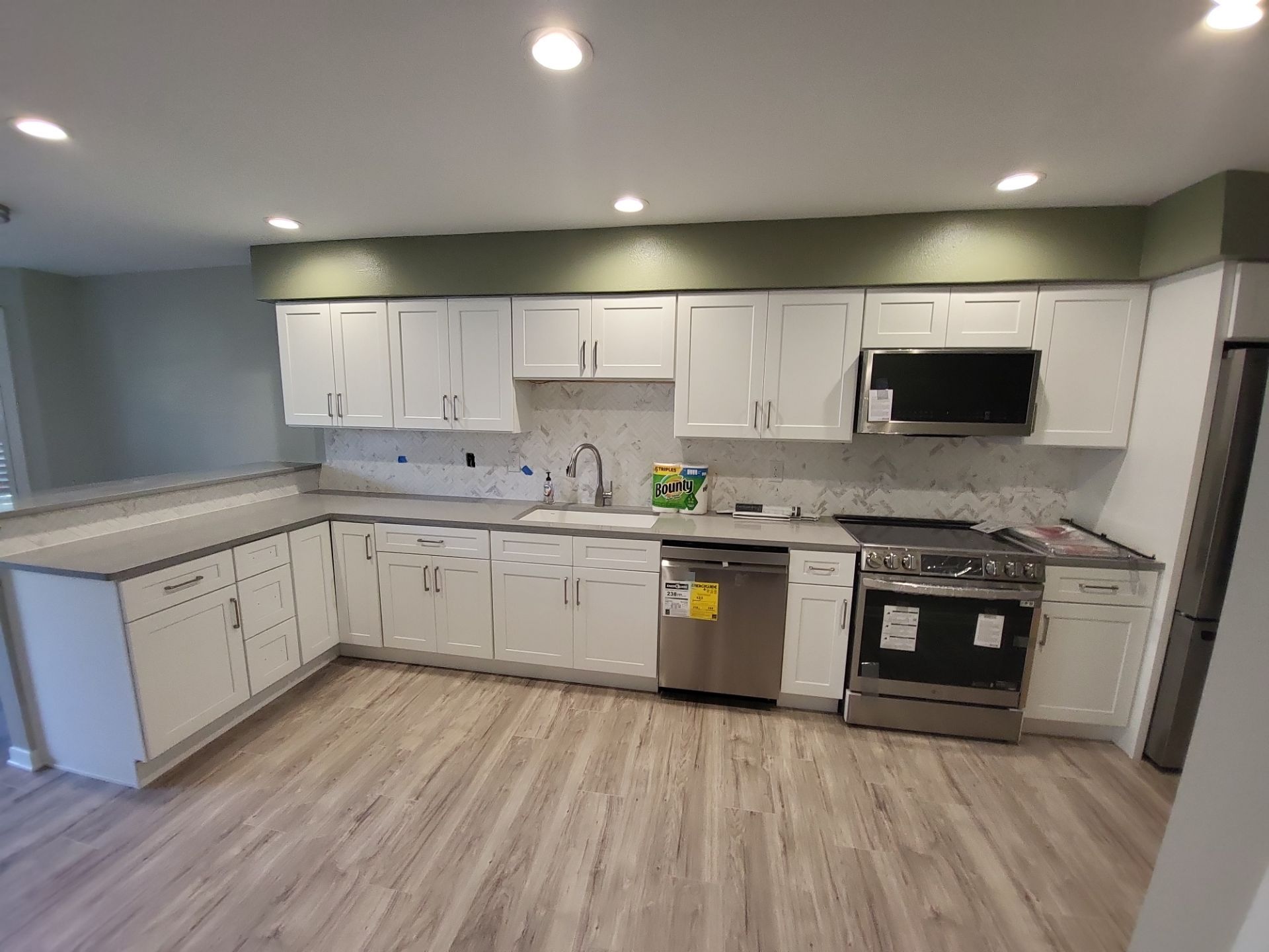 L-Shaped Kitchen Remodel by Legacy Bath and Kitchen 