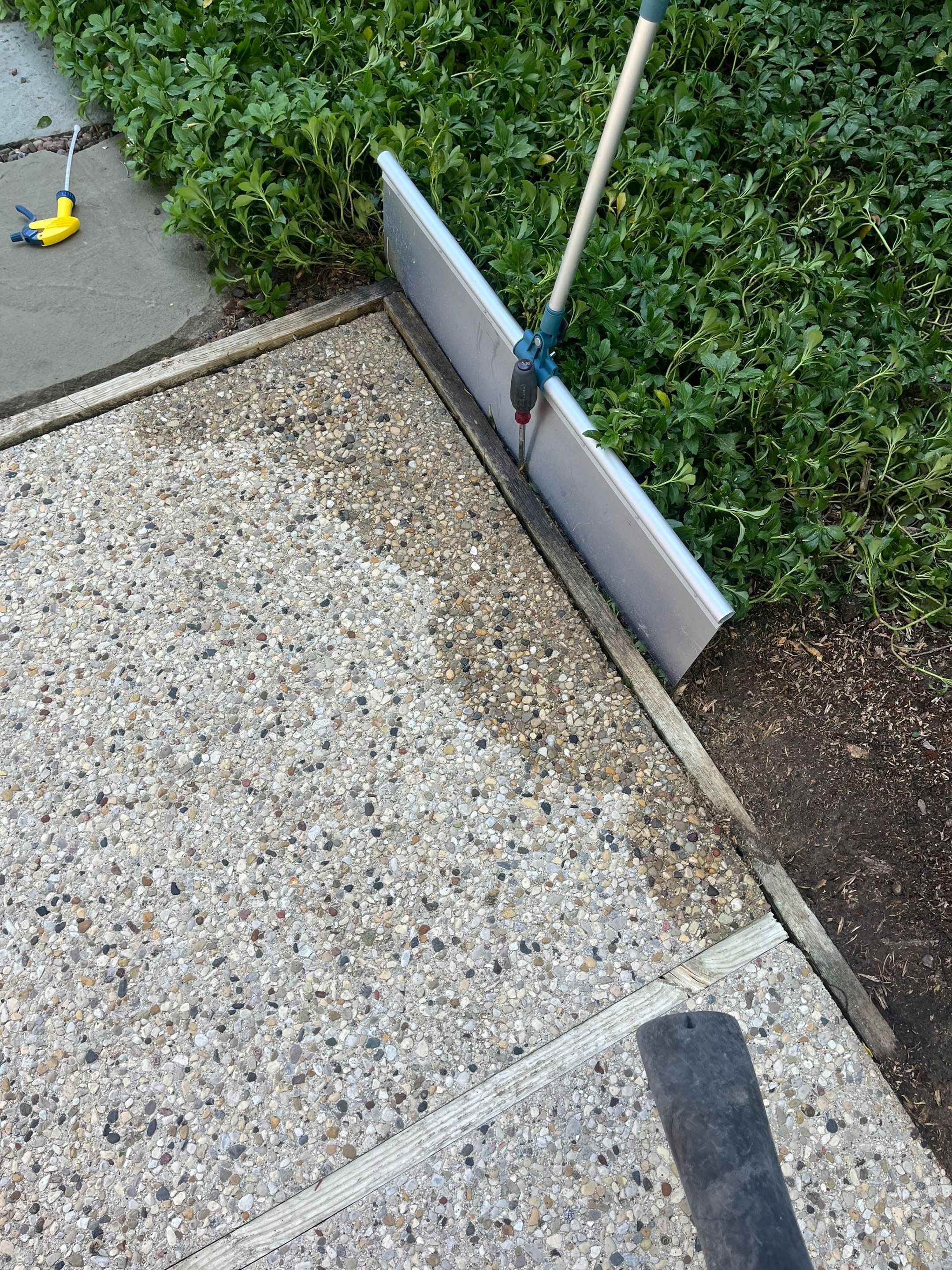Aggregate concrete cleaning and sealing using Surebond SB-9000 by Northern Power Washing LLC.