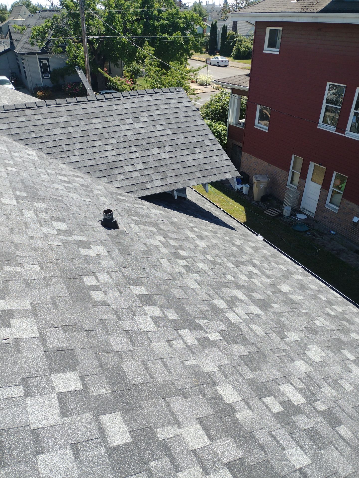 Residential Roofing Installation using IKO Dynasty (Color: Summit Grey) by Orezona Building & Roofing Company, Inc.