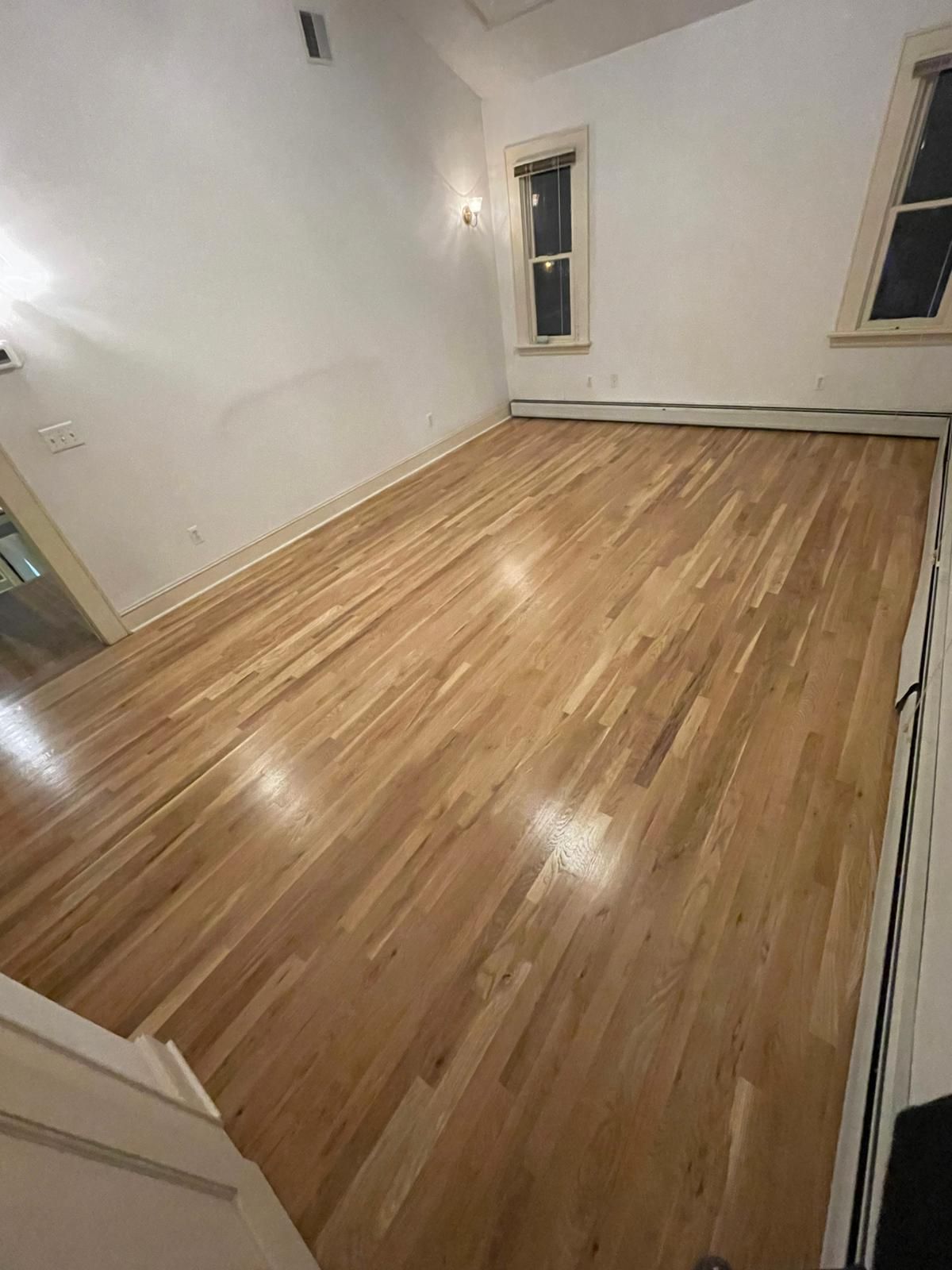 Hardwood floor repair and refinish using Duraseal Natural Stain with Semi Gloss Finish by Footprints Floors Morristown