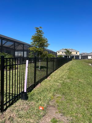 Aluminum Fence Installation using Black 3 Rail Aluminum Fence