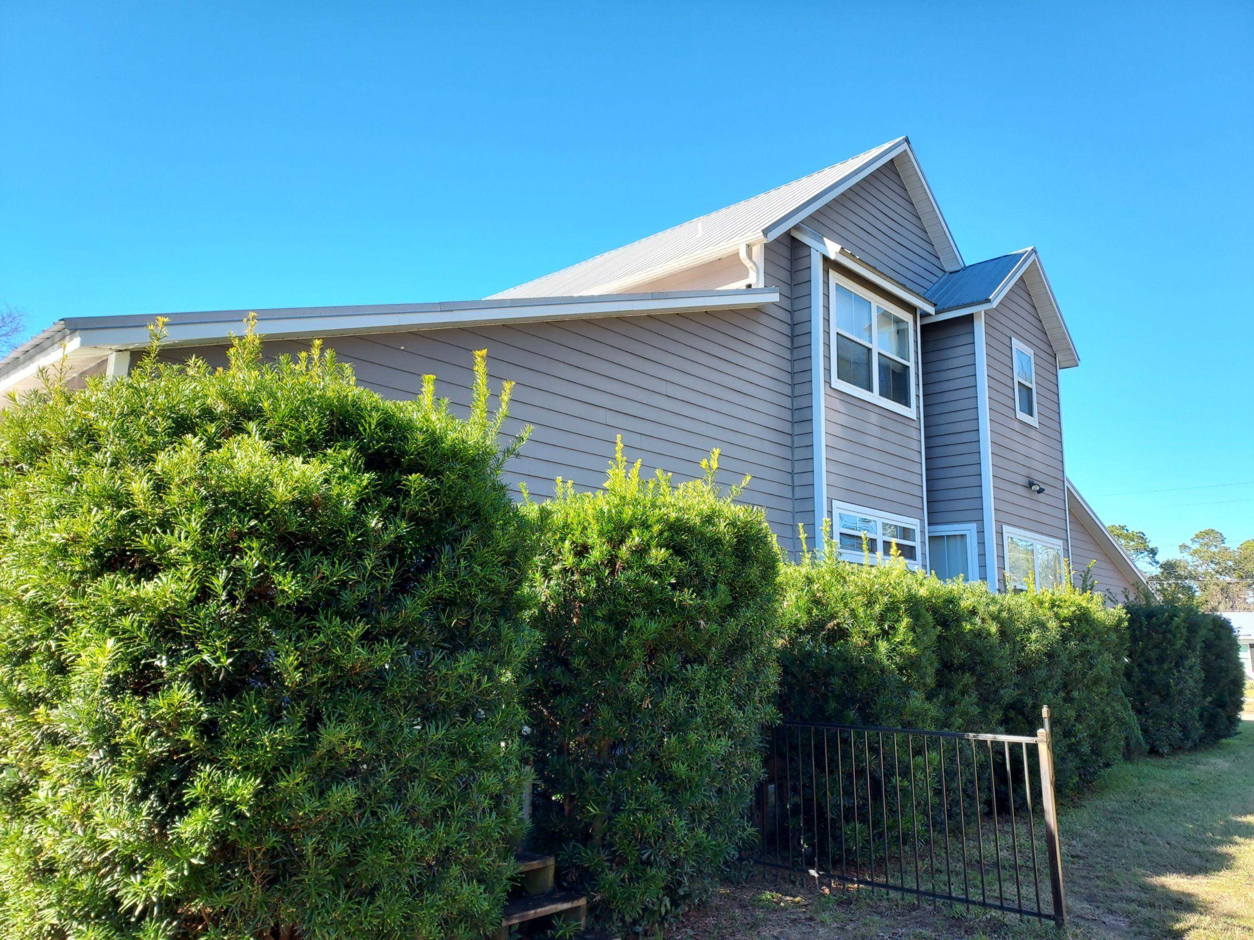 Downspout Extensions for Pensacola Homes by Gutter Professors