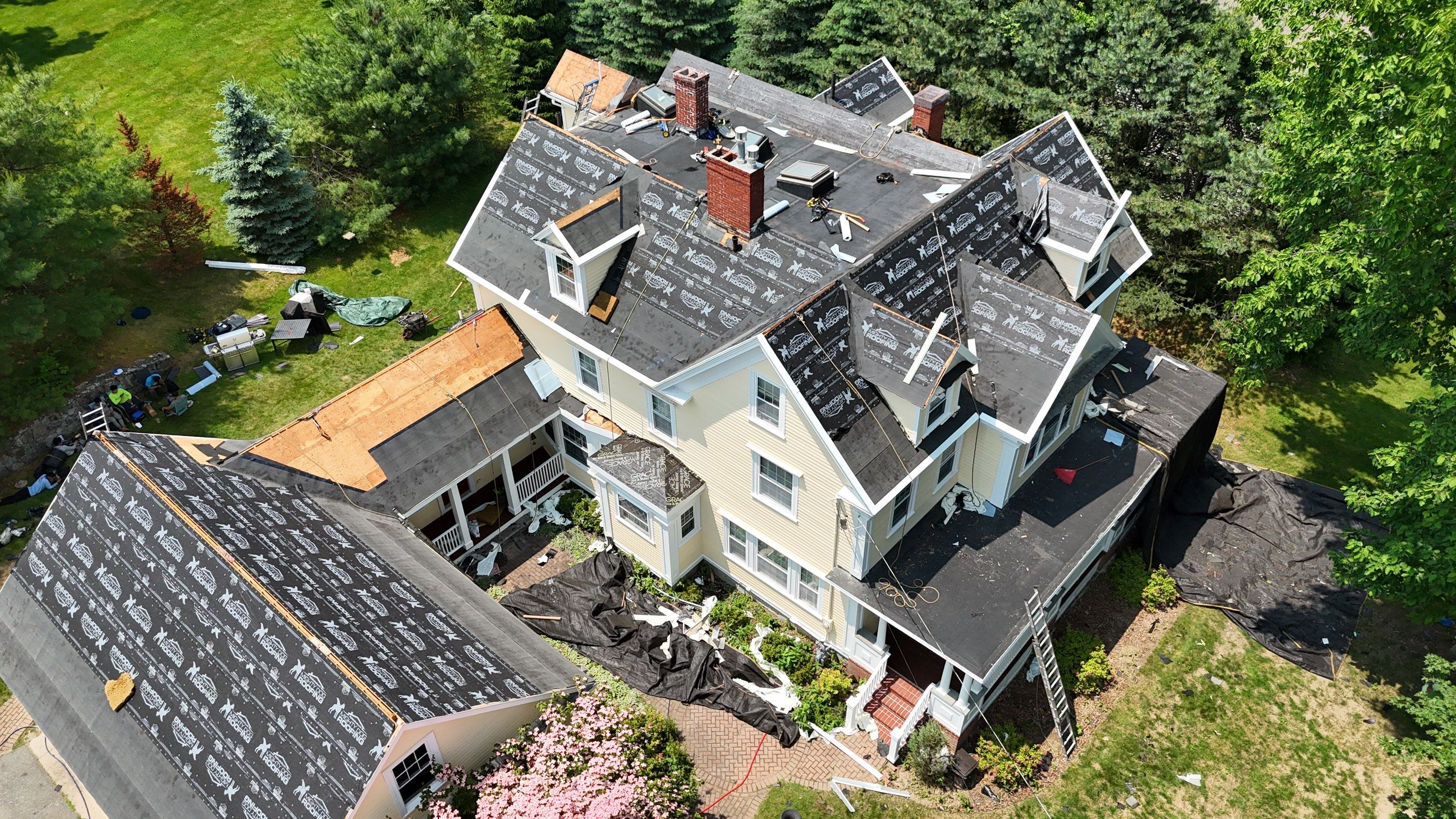 Full Roof Replacement & EPDM Restoration – North Andover, MA by Mighty Dog Roofing of Greater Middlesex County