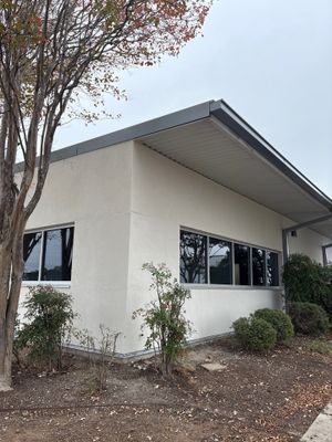 Exterior view of building with metal roofline