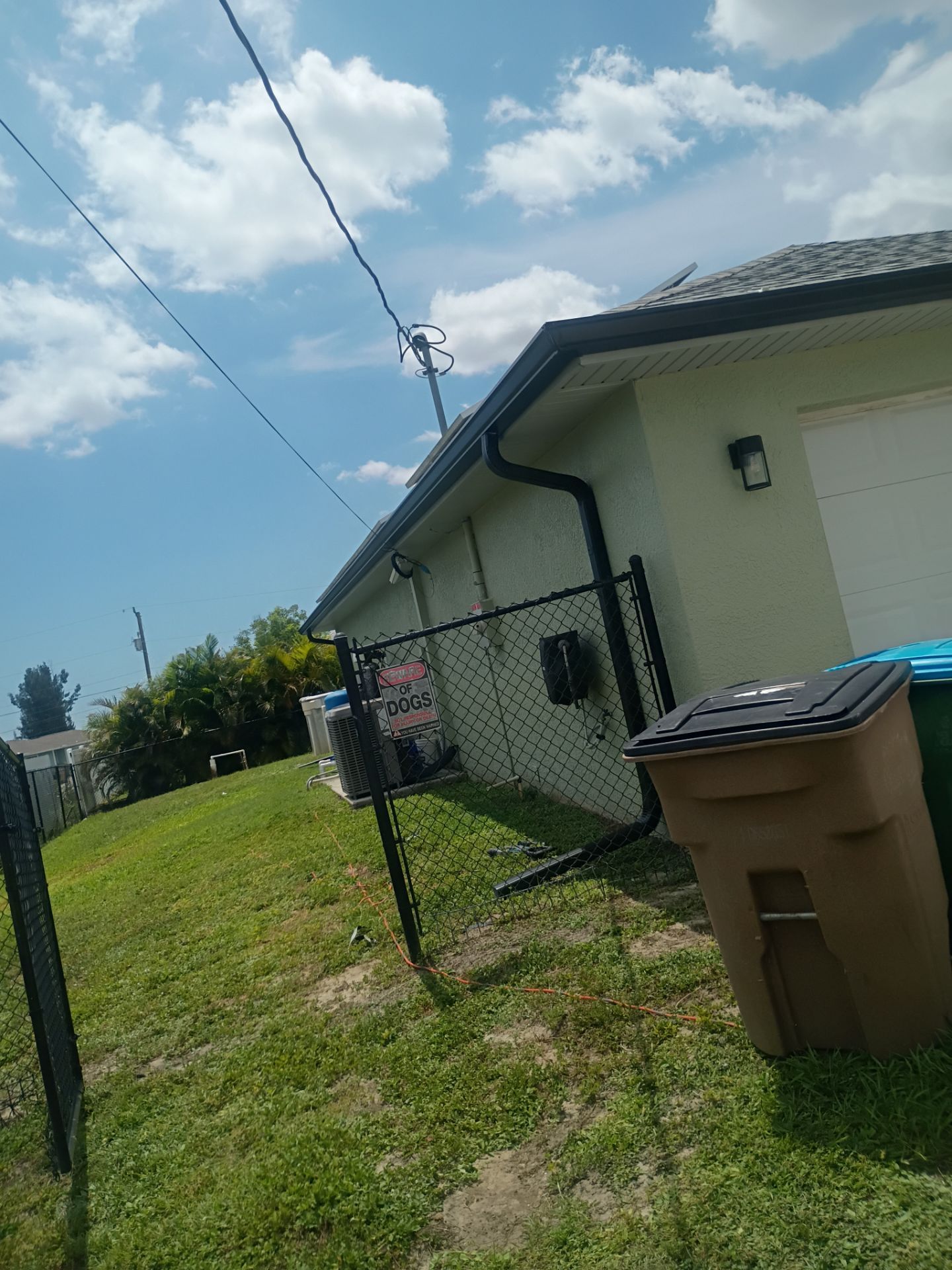 Black Seamless Gutters using K-Style Seamless Gutters in Cape Coral FL by Gutter Professors