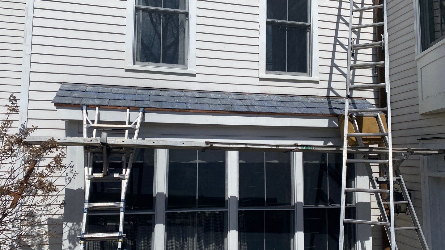 Residential Roofing Installation using Vermont Slate by A Plus Exterior