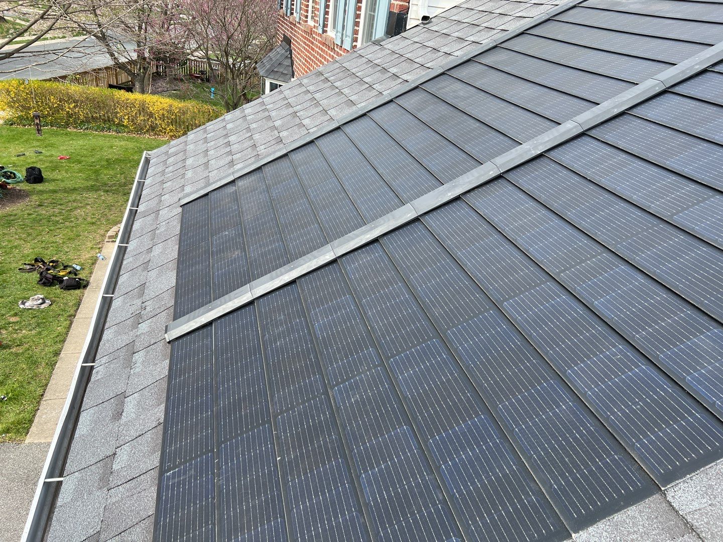Solar Roof Replacement using GAF Timberline Solar Shingles by American Home Contractors
