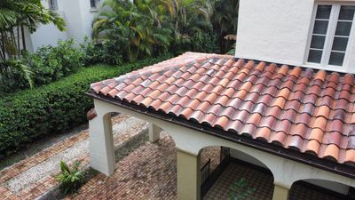 Residential Roofing Installation using Two Piece Clay Barrel Tile with a mortar set application