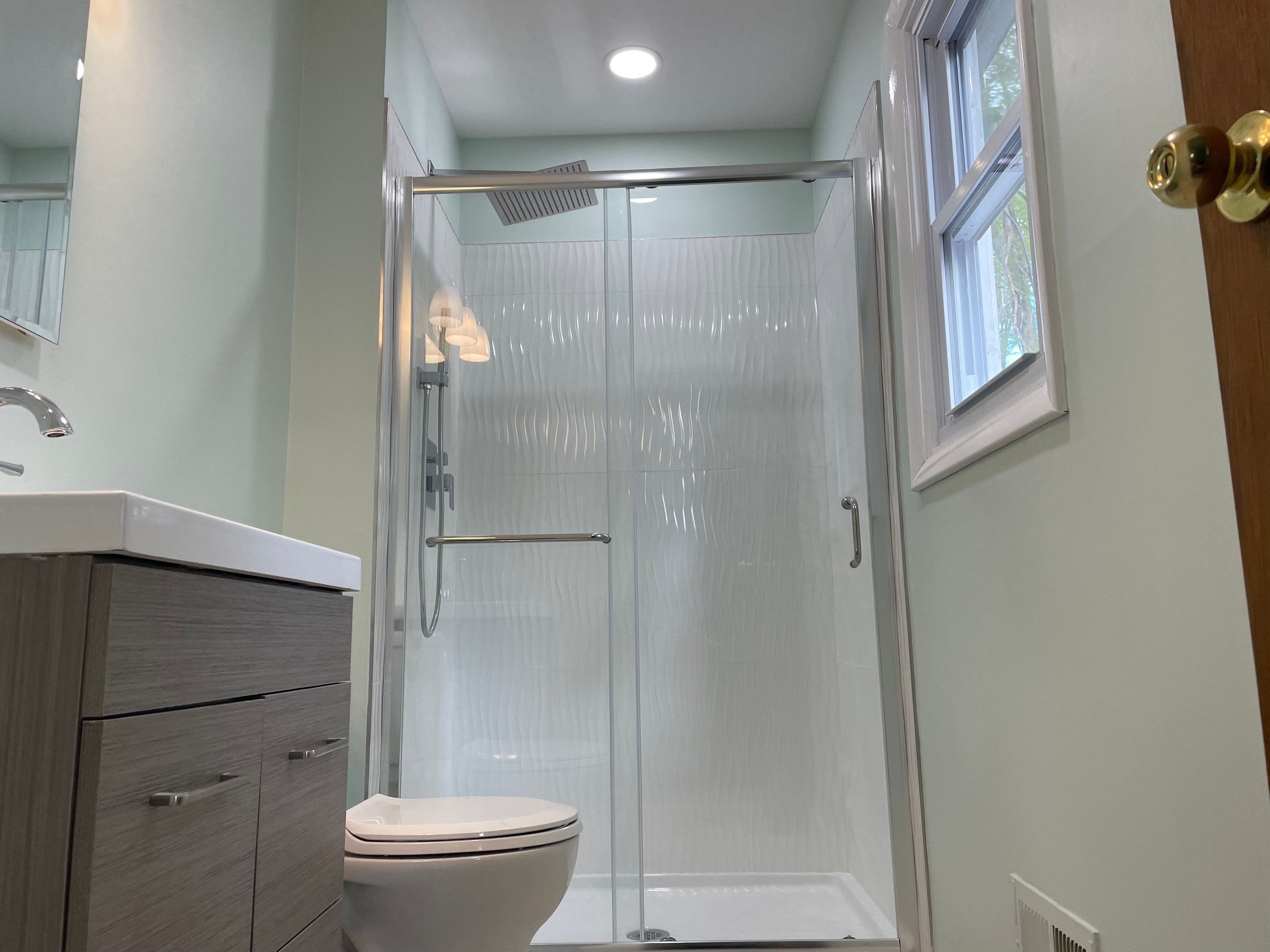 Bathroom Remodel using Tile by Home Concepts Construction