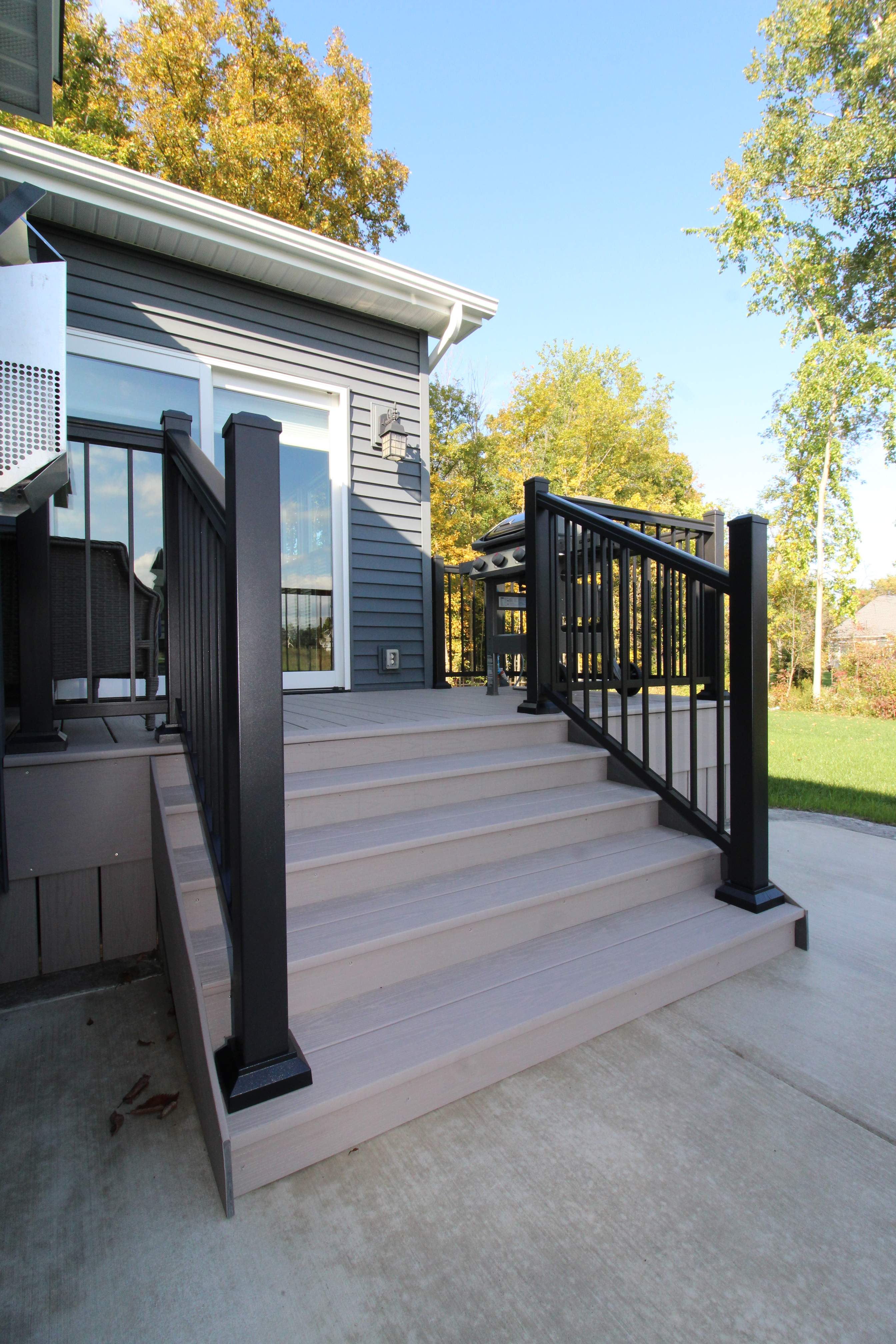 Outdoor Living- Deck and Concrete by Ivy Lea Construction