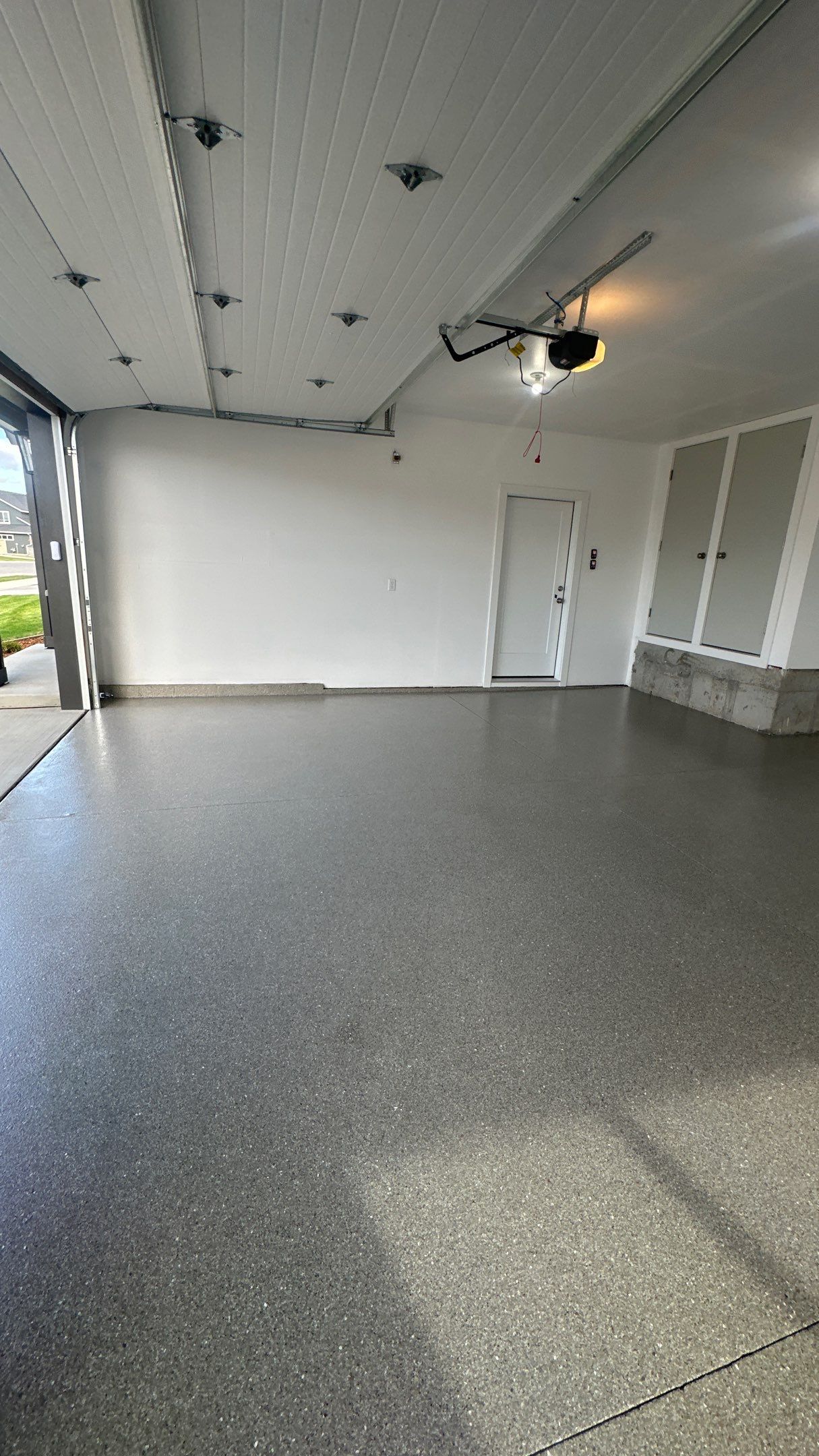 Garage Transformation using Travertine by Croc Coatings, LLC