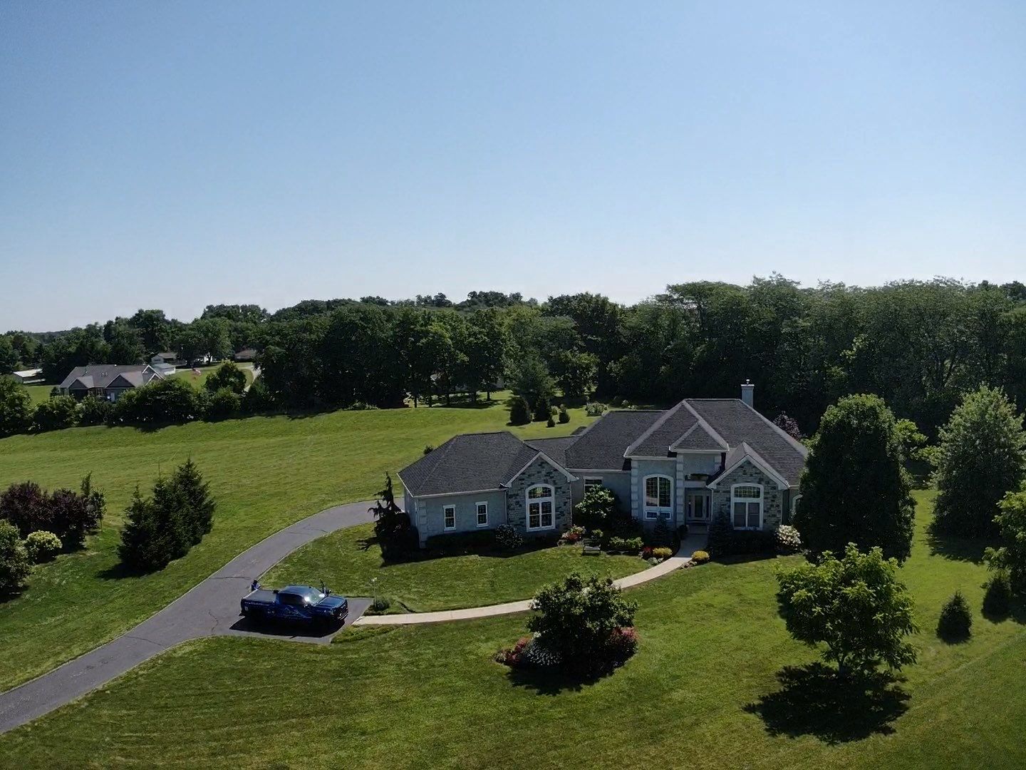 Residential Roofing Installation using Atlas Pinnacle Black Shingles by 614 Exteriors