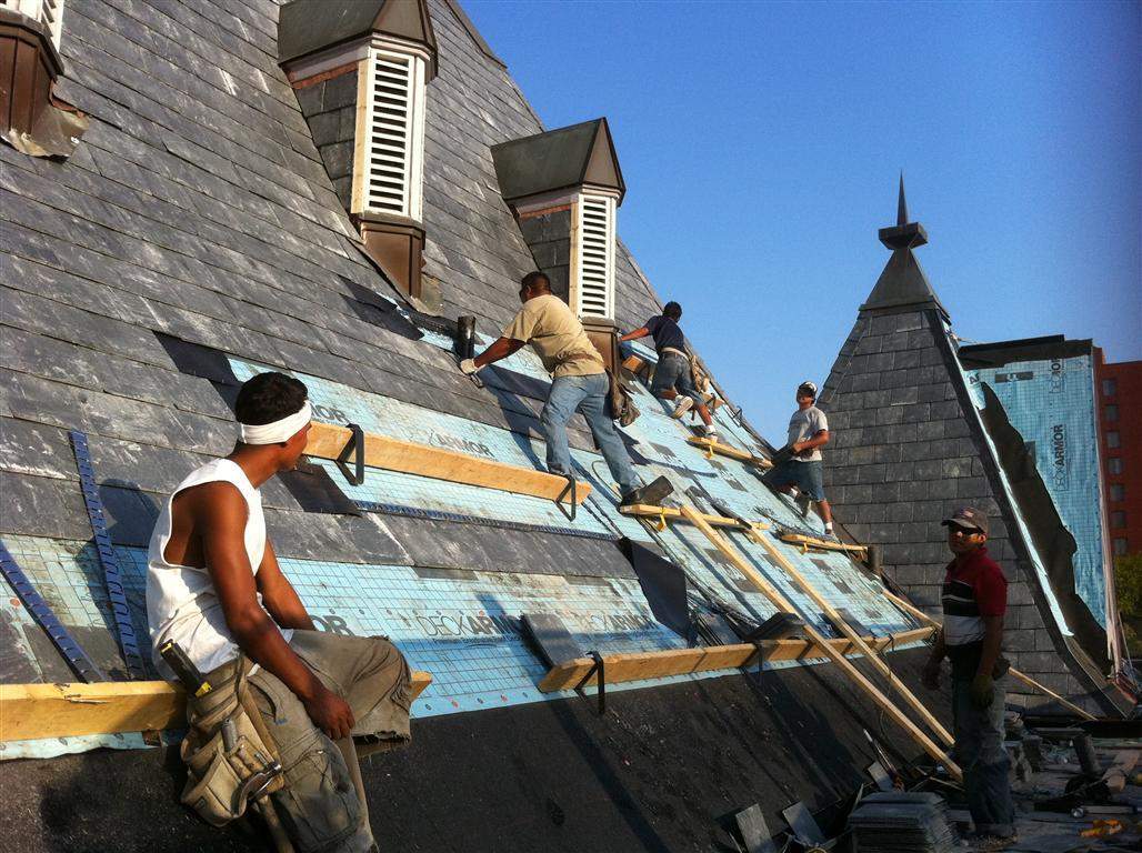 Historic Building ROOF REPLACEMNT with GAF TruSlate  on steep slop and Versico 60mil TPO on flat roof by Gorilla Exteriors Contracting, LLC