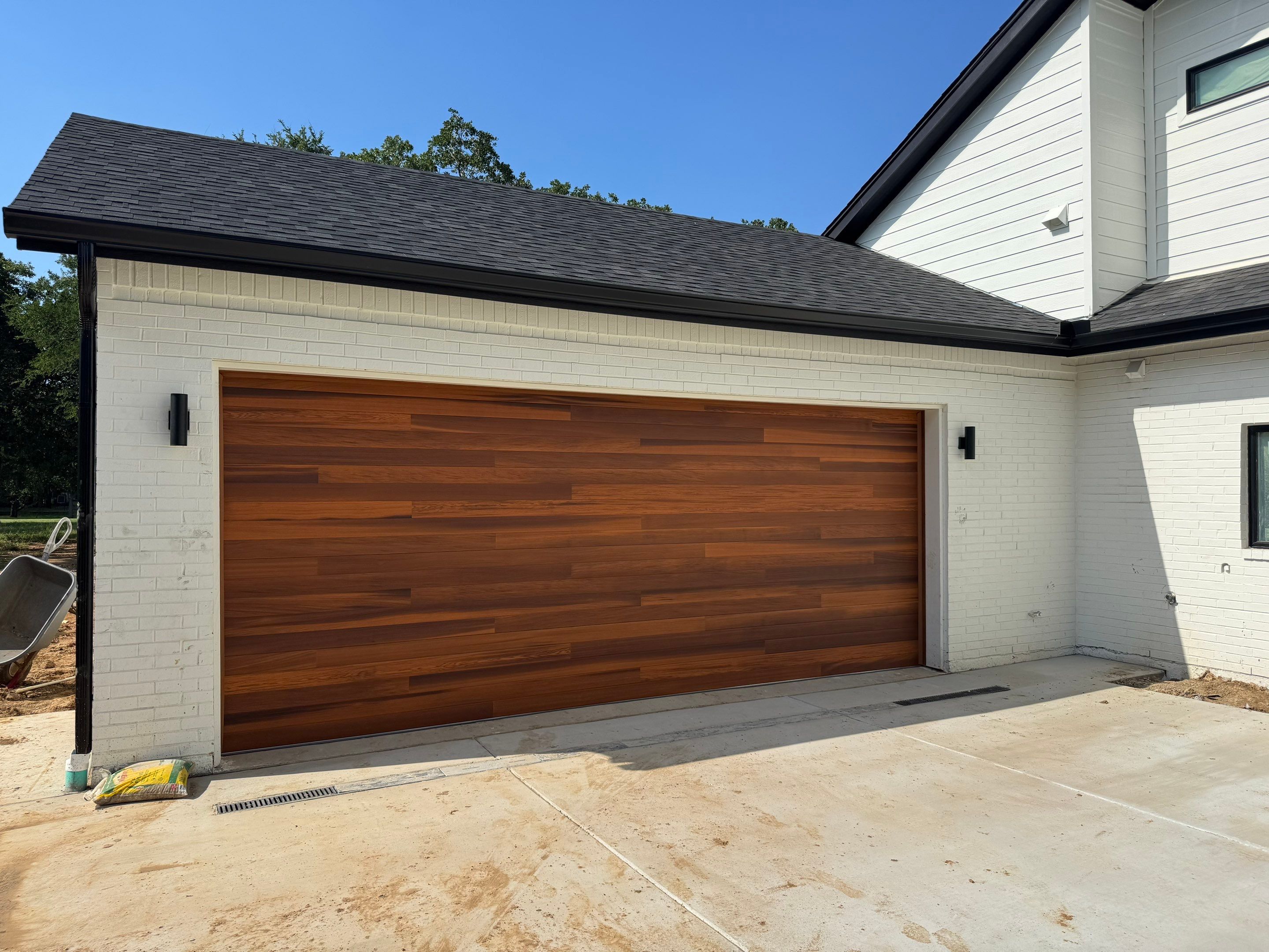 Modern CHI Cedar Garage Door and LiftMaster Opener in Trophy Club by Meadows Garage Doors