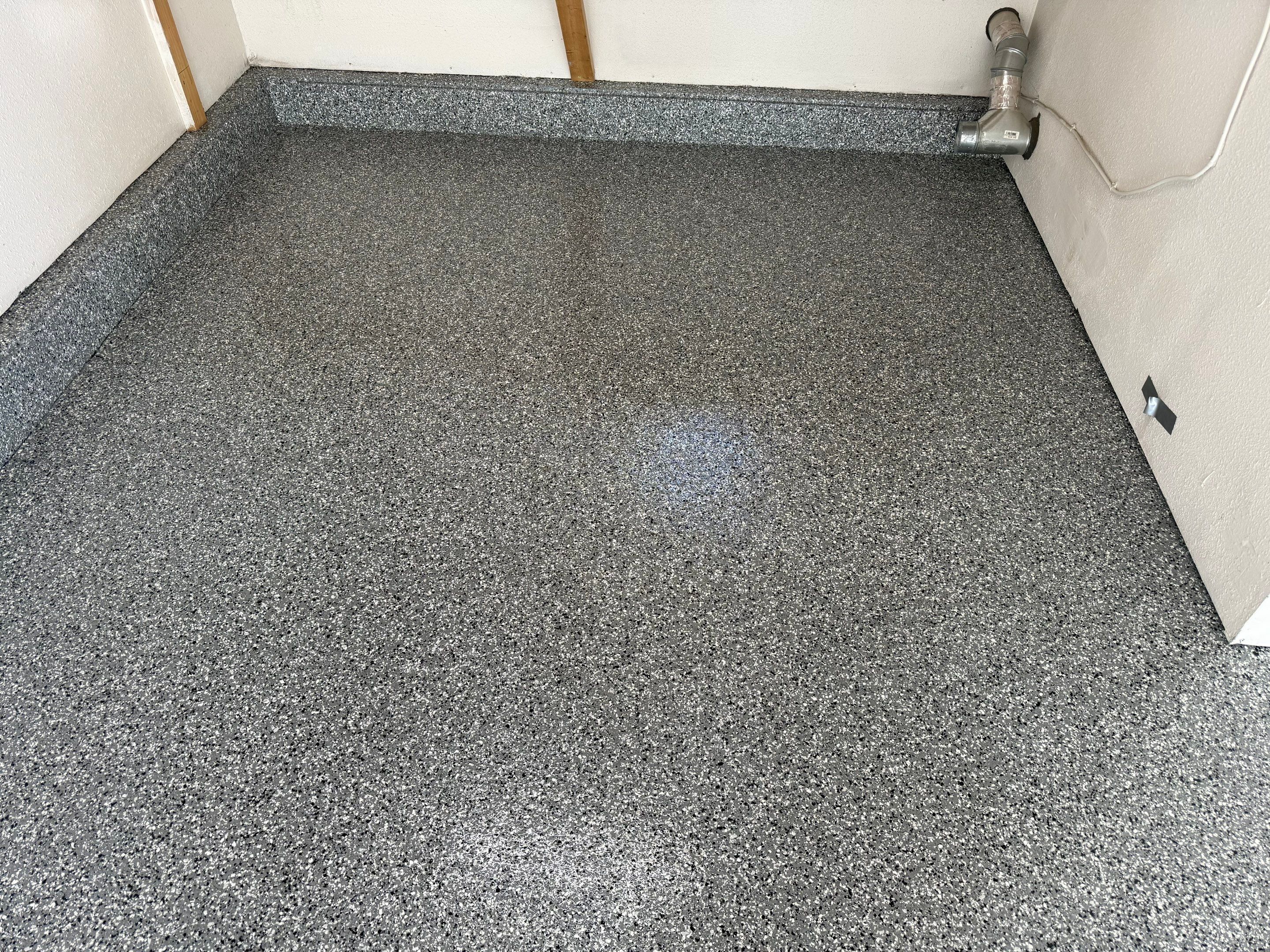 Smoke Flake Garage Floor Coating in Dell Rapids by Select Painting, Coatings & Garage Cabinets