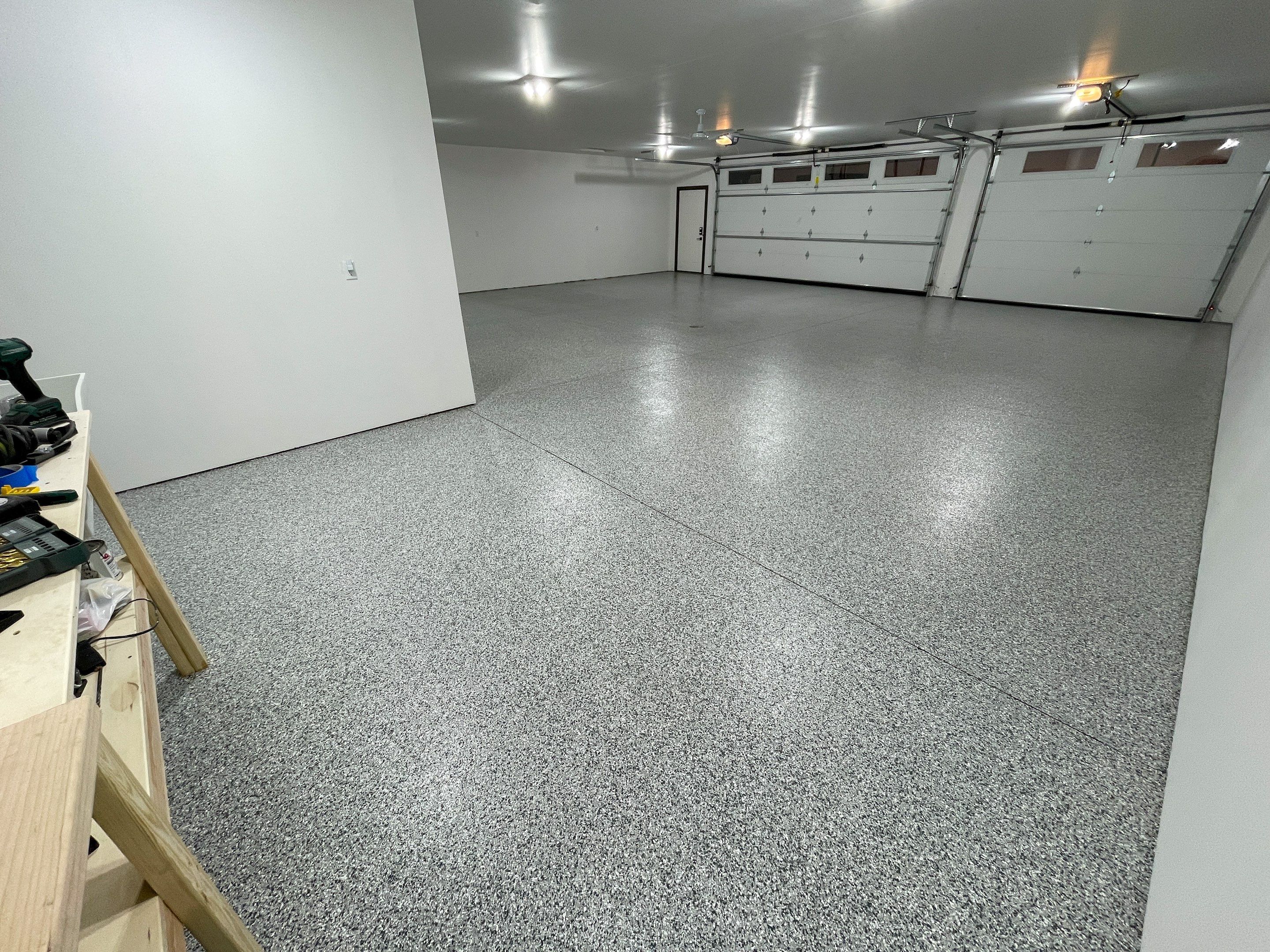 Garage using Slate Stone by Select Painting, Coatings & Garage Cabinets