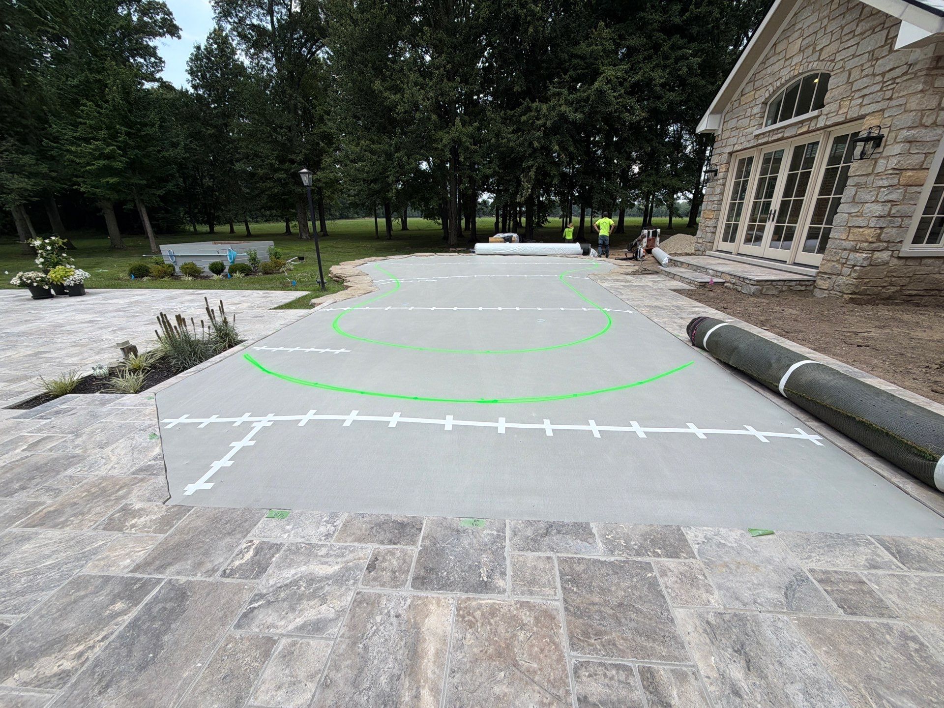 Custom Backyard Golf Green Accented by Flagstone Border in Morrow, OH by Southwest Greens Midwest