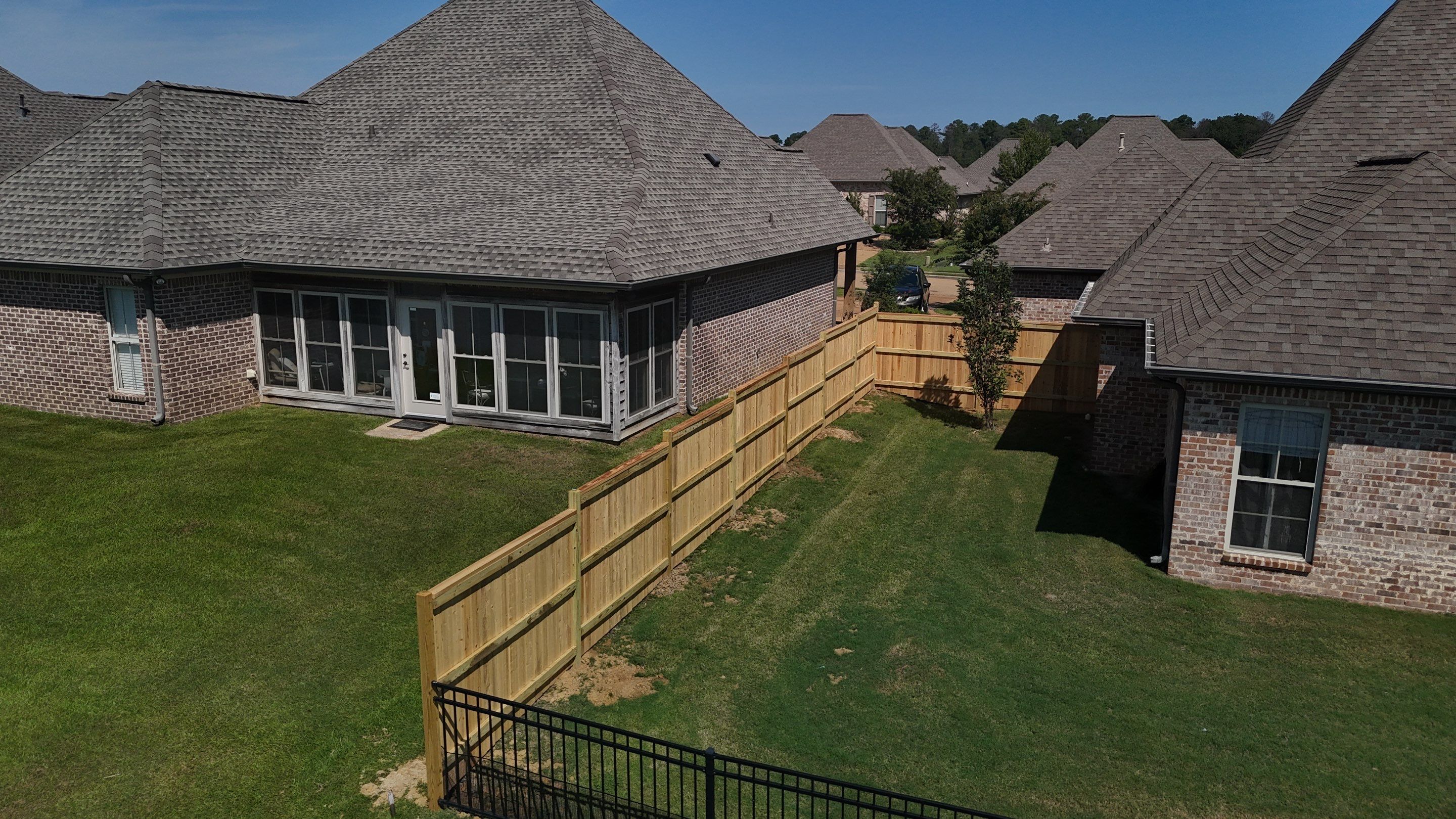 6’ Treated Pine Good Neighbor w/4’ Steel by Roberson Construction LLC