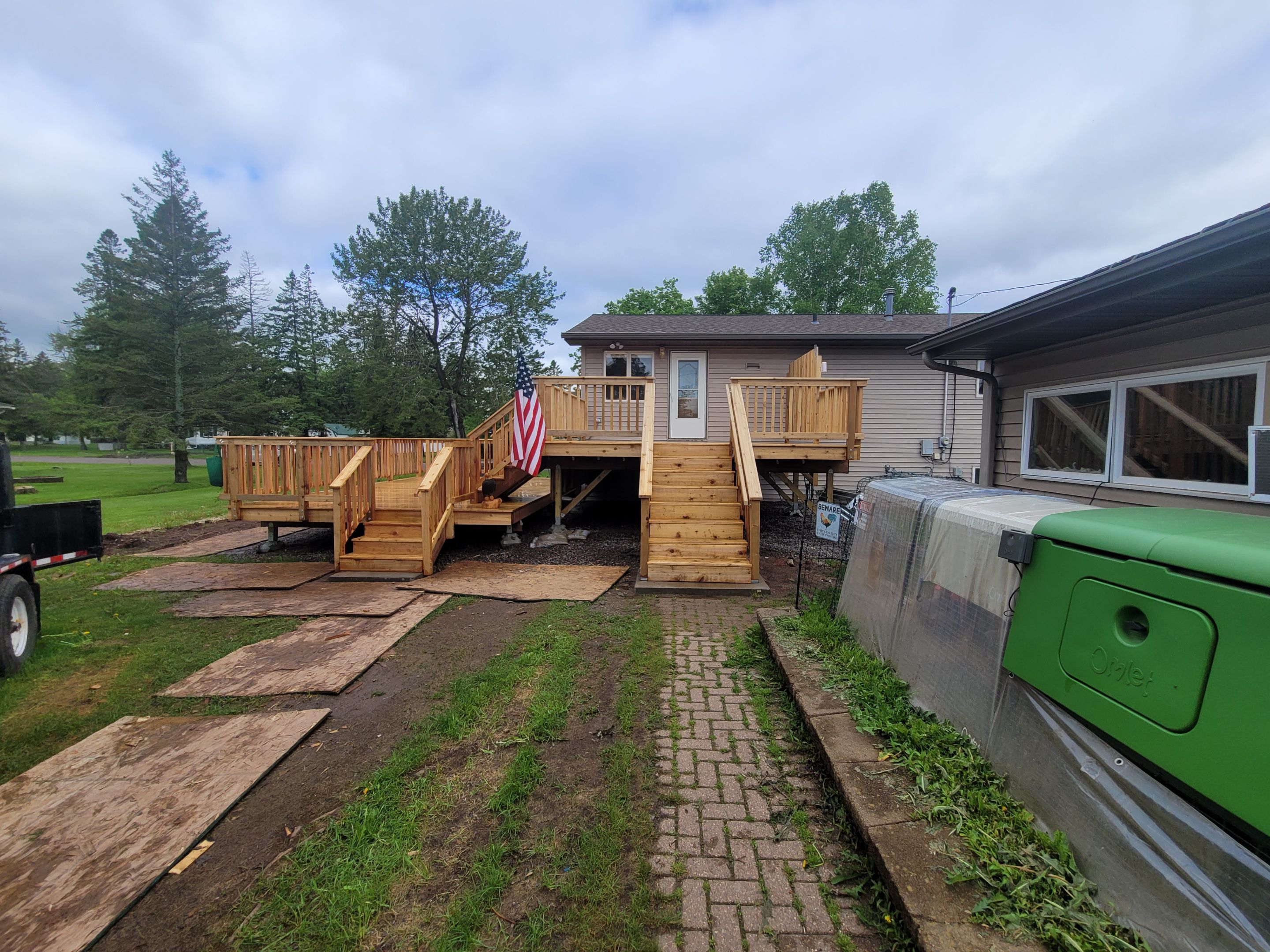 Multi-Level Cedar Deck by Anchor North Property Services