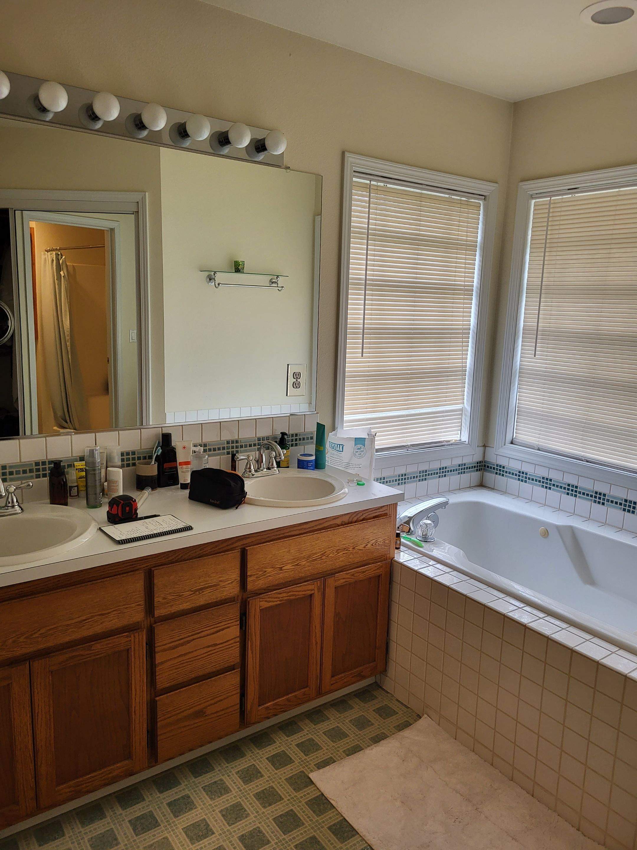 Milwaukie Dual Bathroom Remodel by American Made Construction 