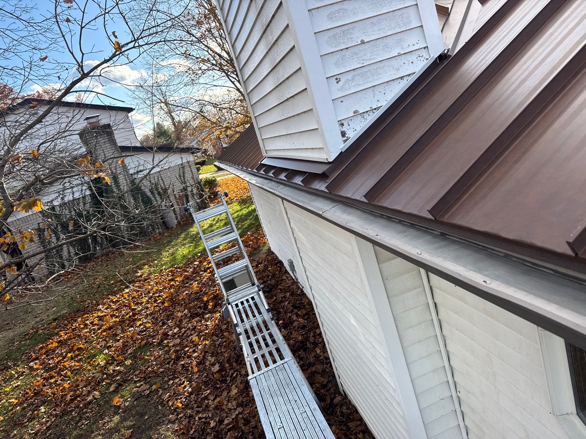 Roof Replacement using MS Standing Seam Roof Western Rust by 180 Contractors