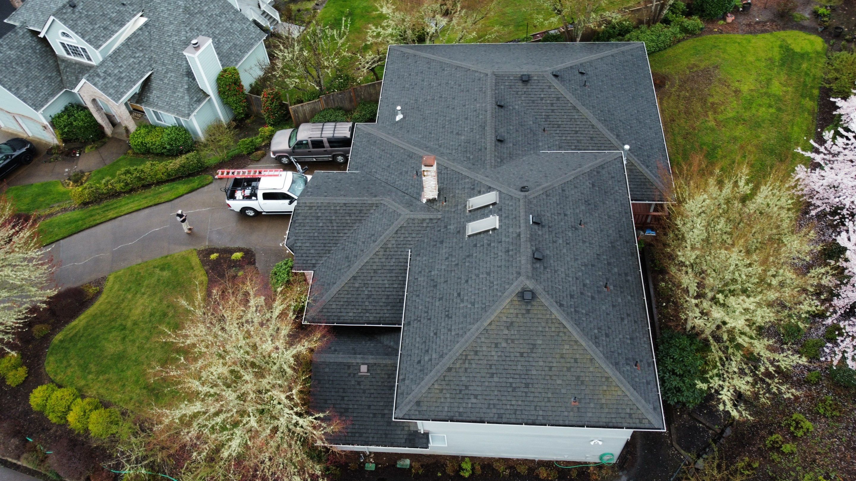 Residential Roofing Installation using IKO Dynasty (Color: Granite Black) by Orezona Building & Roofing Company, Inc.