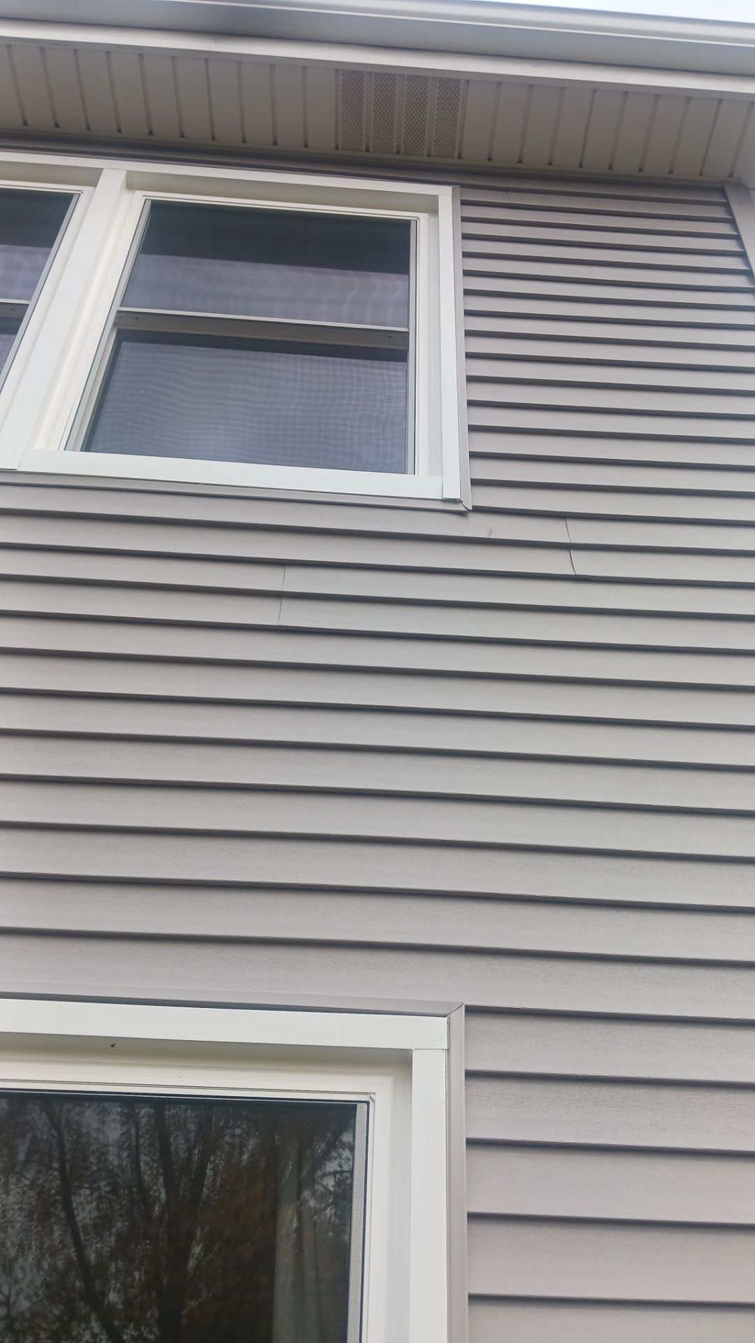 New Siding and Windows by NextWave Construction