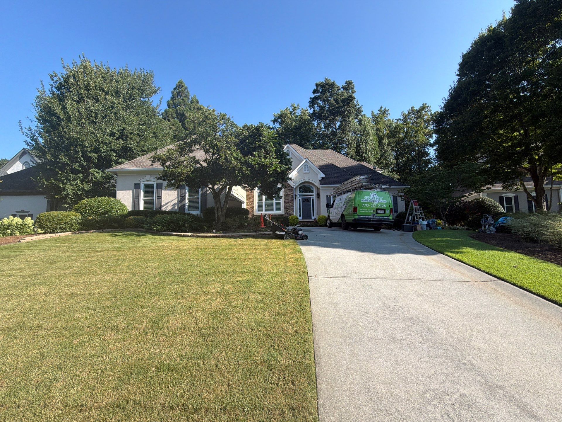 Multi-Story Stucco Home Exterior Painting and Garage Refresh in Marietta by Swift Home Renovations 