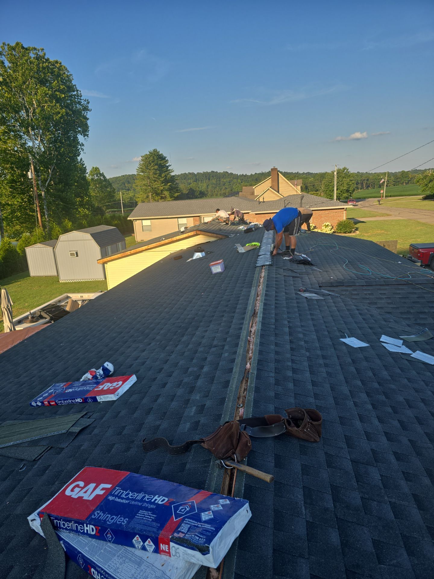 Residential Roofing Installation using GAF Timberline HDZ Charcoal by Rainstoppers Roofing