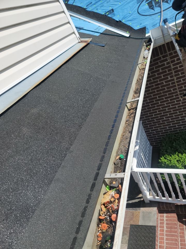 Residential Roofing Installation using Roof Replacement by American Roofing & Construction LLC