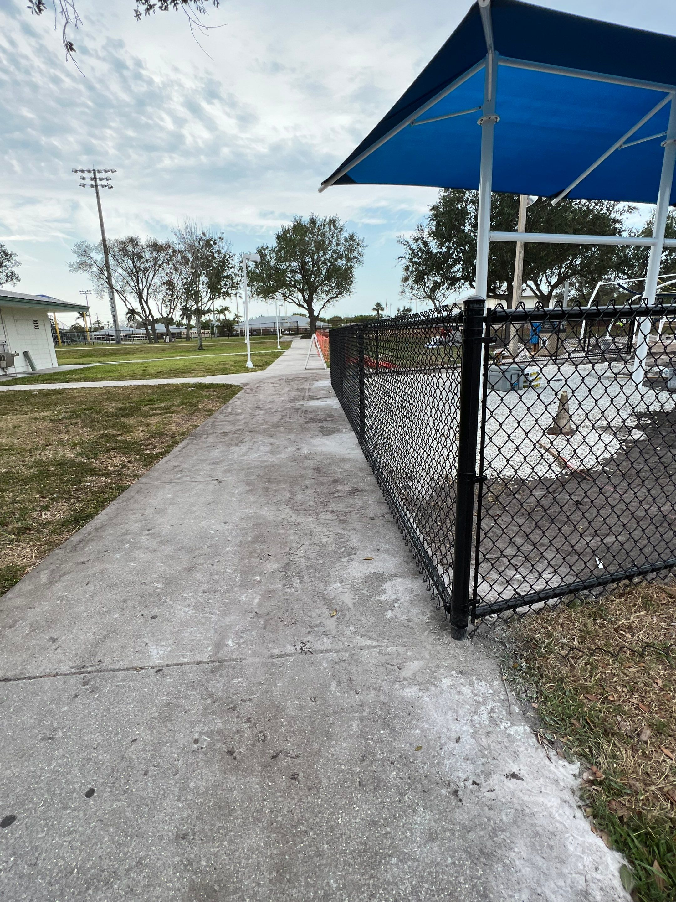 Vinyl Coated Chain-link fence for the City of Naples around Fleischmann Park Playground.  by Asap fence and gates, LLC