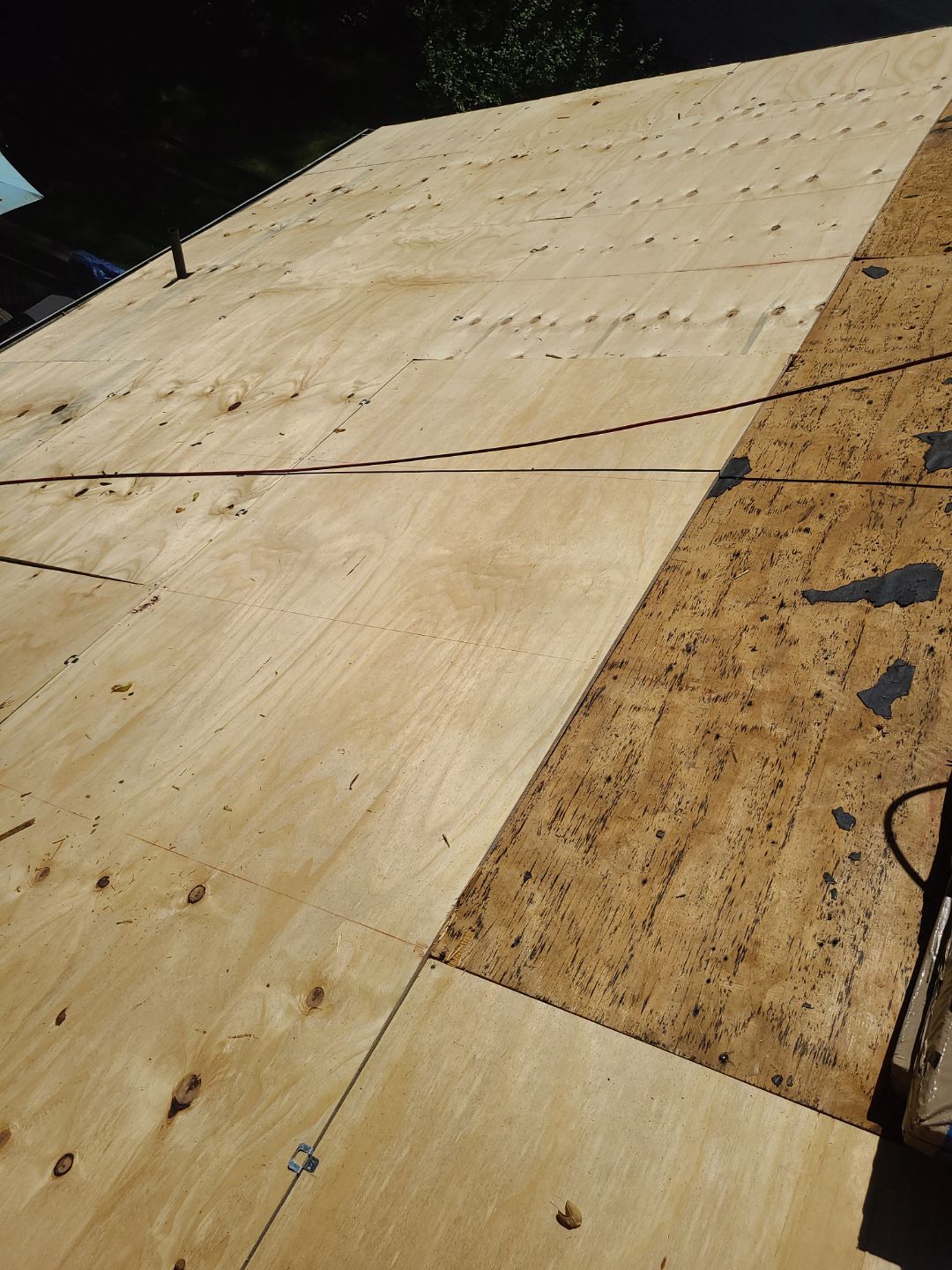 Burke: CertainTeed Landmark Designer Shingles in Moire Black by RM Banning, Inc.