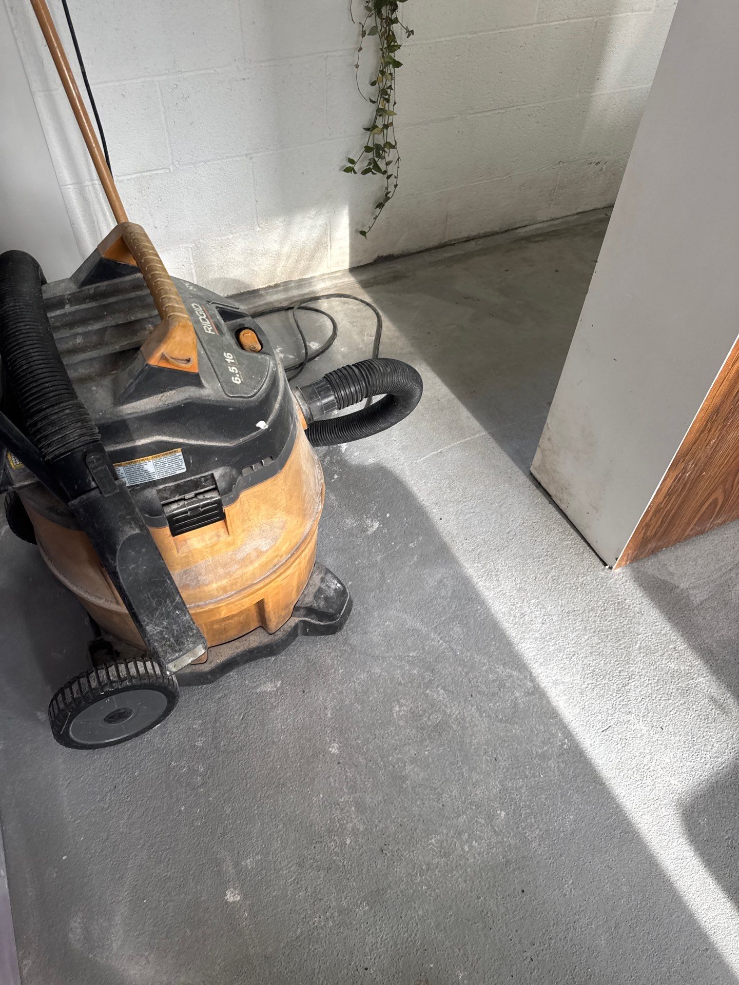 Grey Epoxy Flake Floor Installation for a Muskegon Sunroom by Gordon Painting