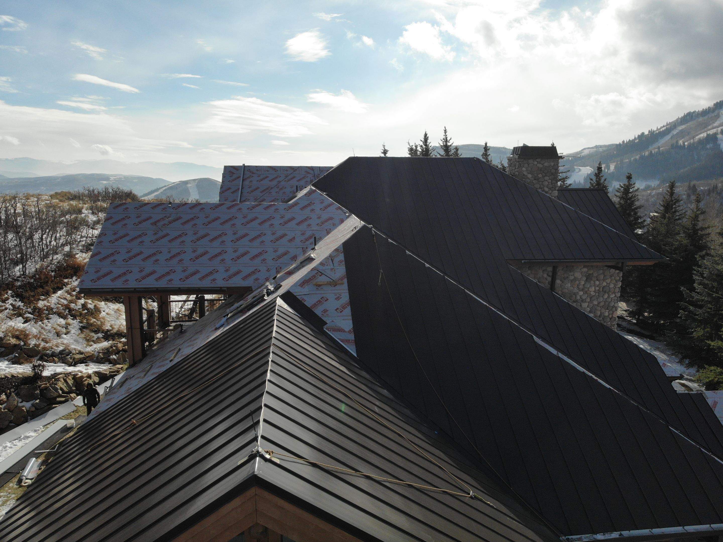 Standing Seam Metal Roof Replacement After Snow Damage by ASAP Roofing & Restoration