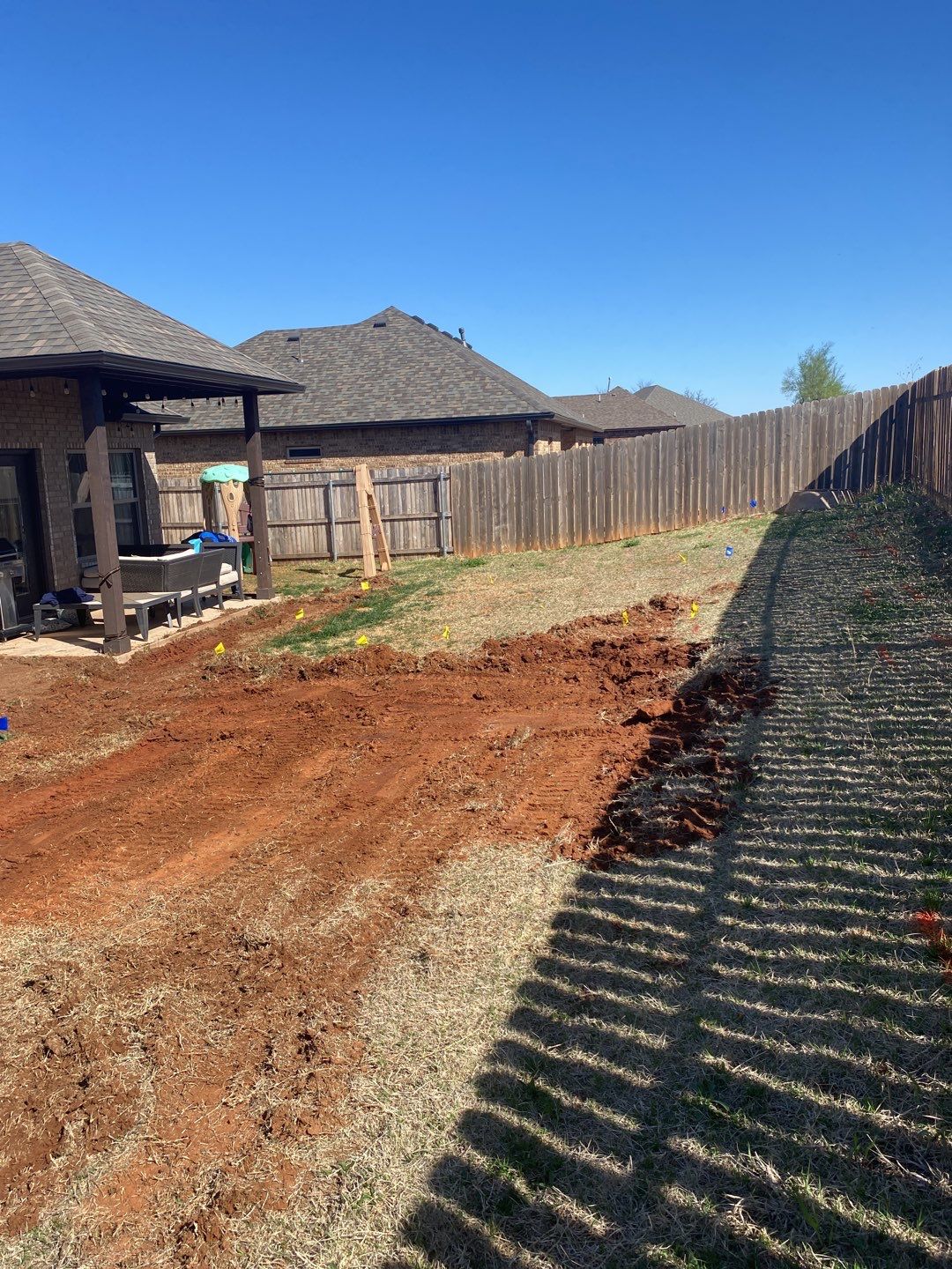 Retaining wall / Playground by Clays Services Inc