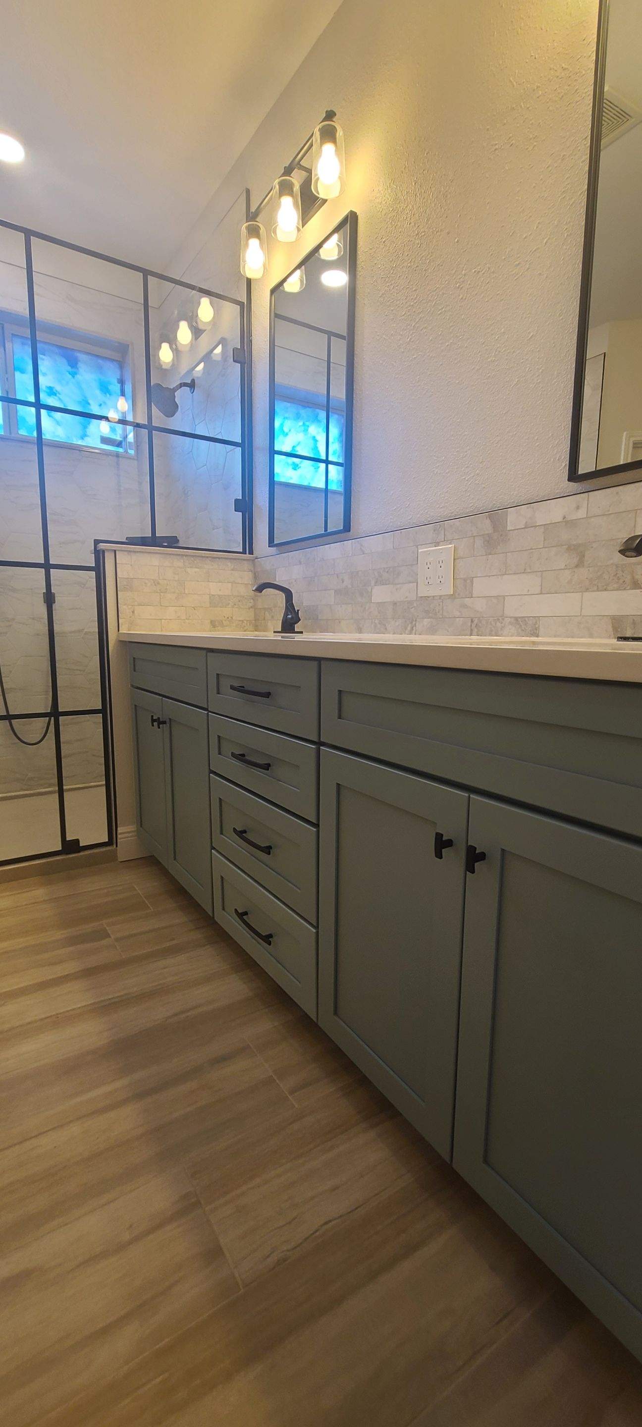 Stone Oak Bathroom Remodel with Paned Shower Glass by Legacy Bath and Kitchen