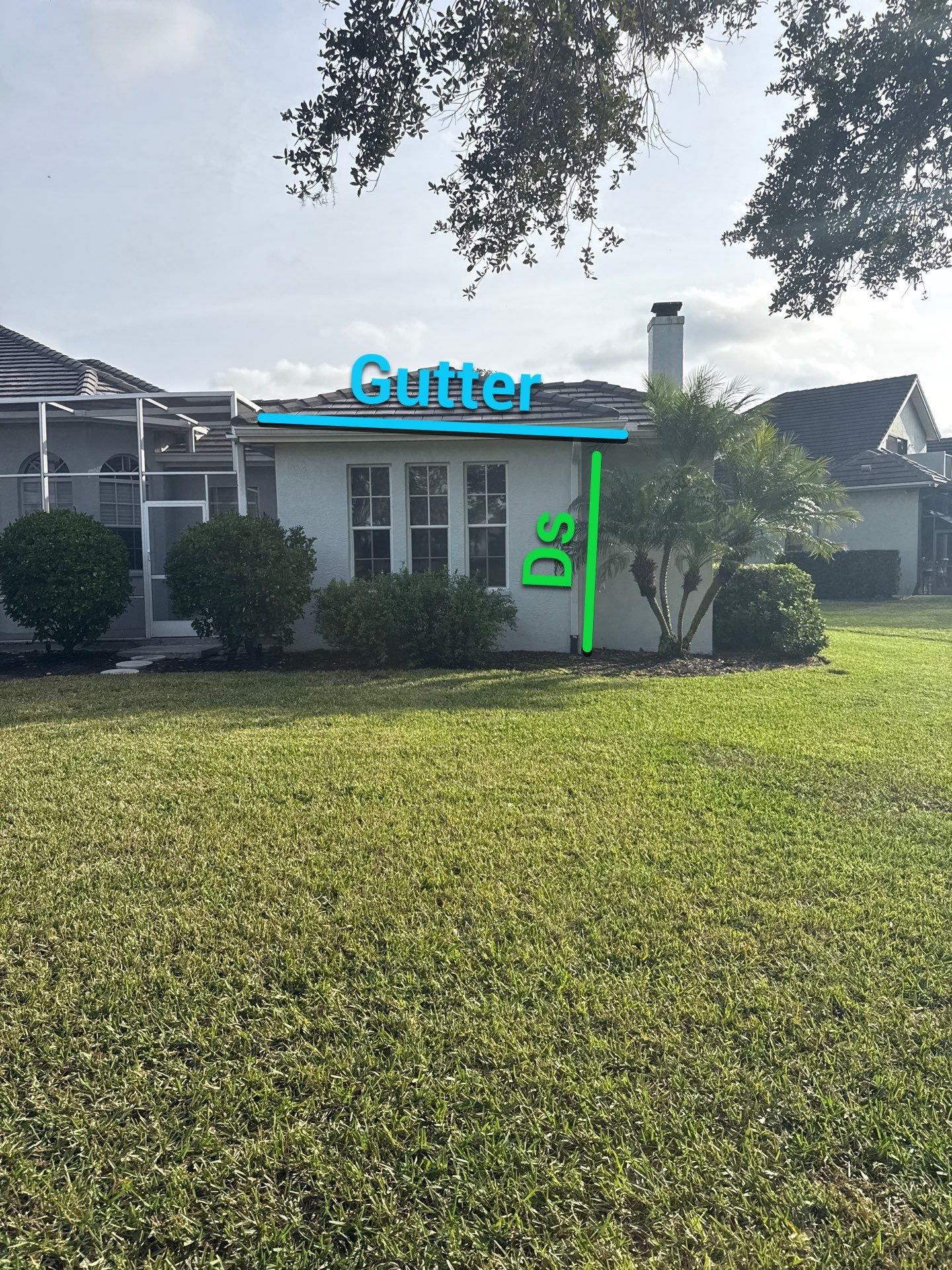 White Down Spouts using downspouts and White Seamless Gutters in Sarasota FL by Gutter Professors