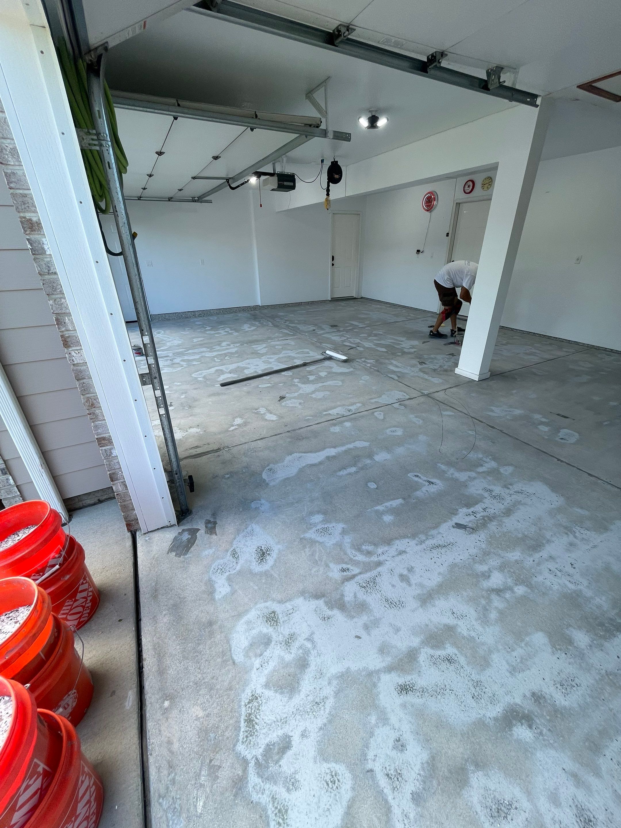 Multi-Car Garage Concrete Coating with Coyote Flake Finish in Sioux Falls by Select Painting, Coatings & Garage Cabinets